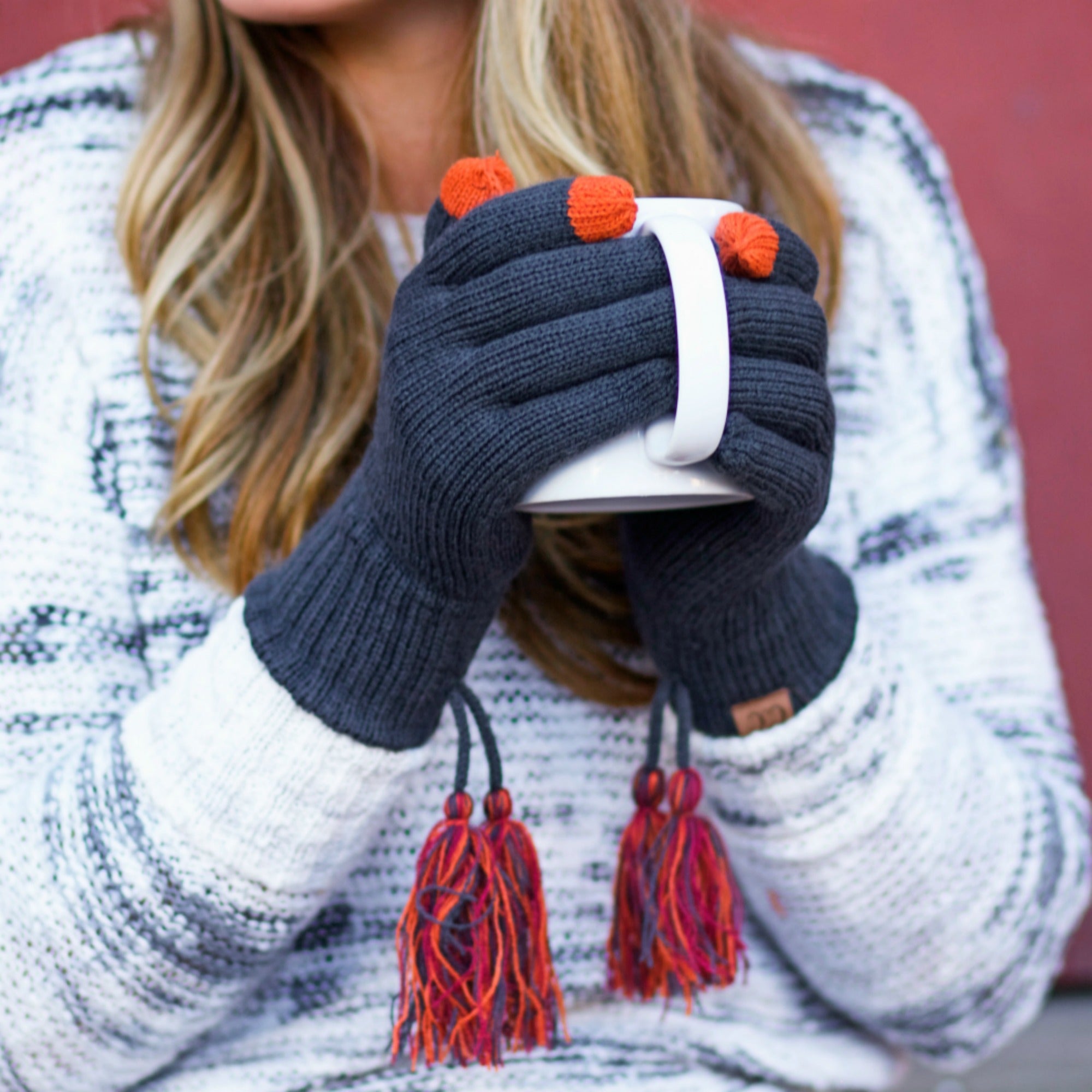 CC Touchscreen Gloves with removable cuff and pom, showcasing a stylish cable knit pattern in soft acrylic material.