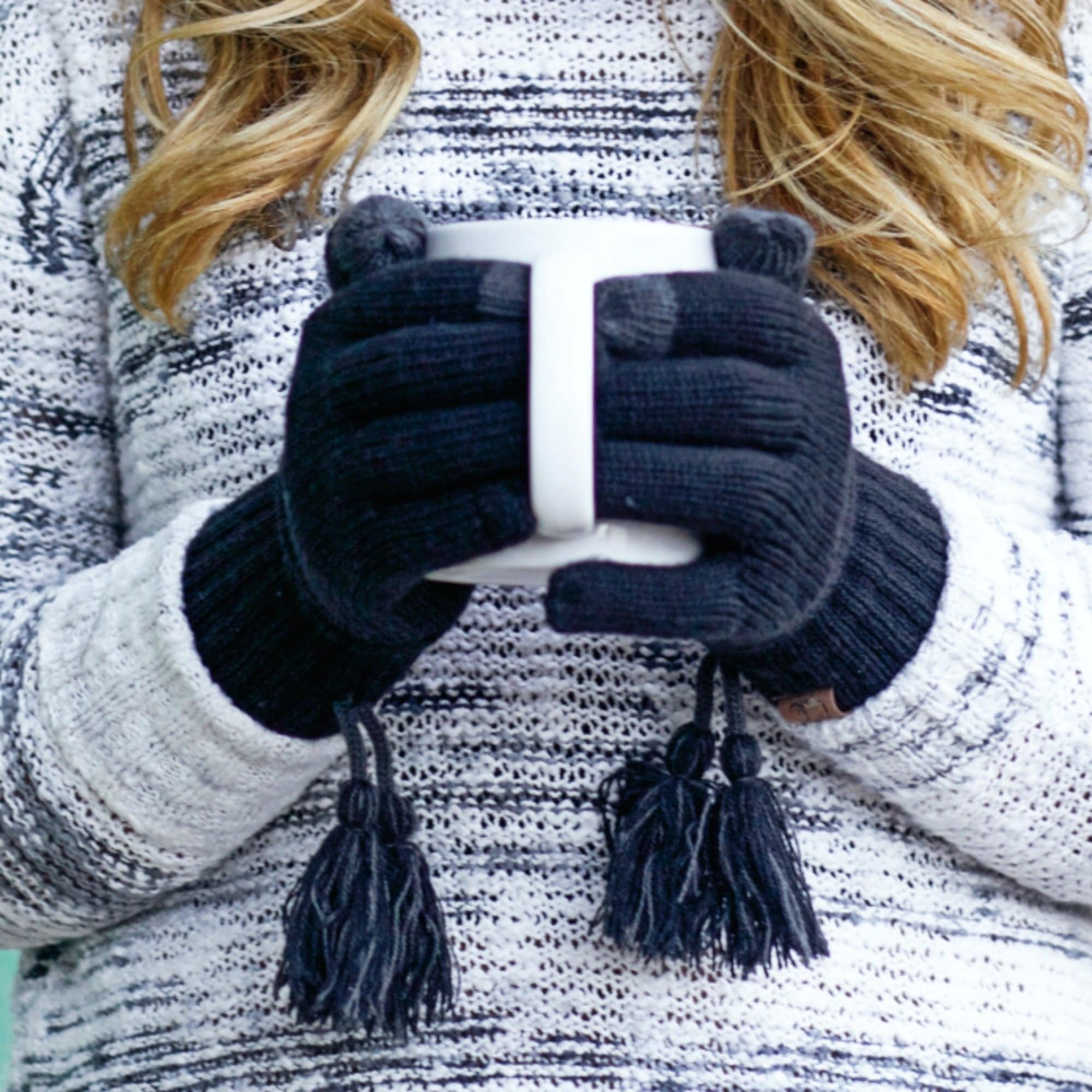 CC Touchscreen Gloves with removable cuff and pom, showcasing a stylish cable knit pattern in soft acrylic material.