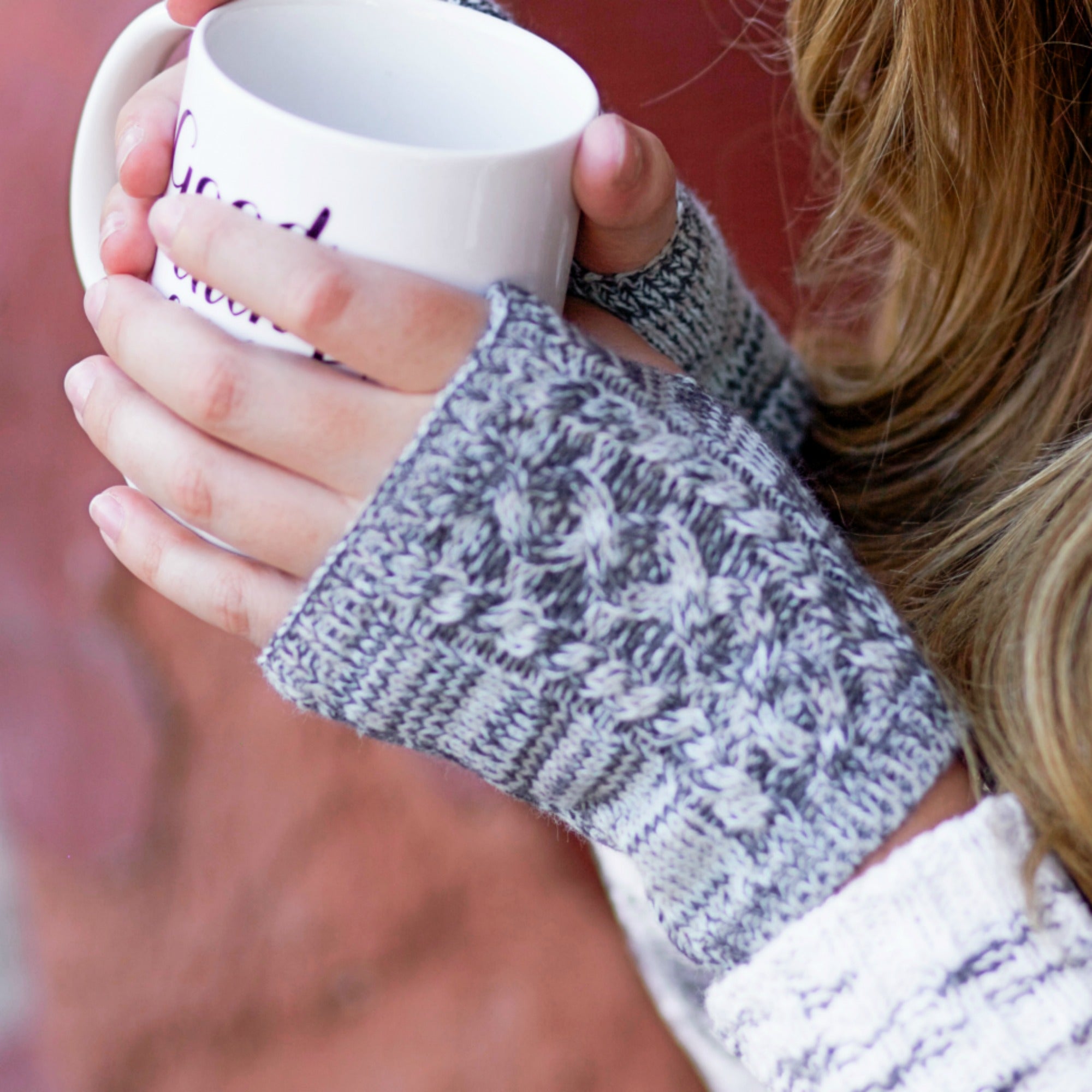 CC Touchscreen Gloves with removable cuff and tassel, showcasing a stylish cable knit pattern.