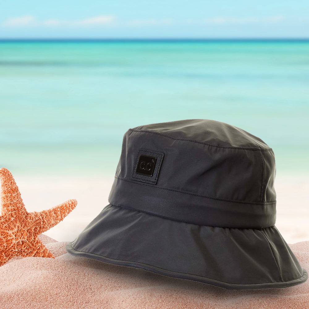 CC Waterproof Reflective Bucket Hat showcasing its stylish design, adjustable chin strap, and waterproof material, perfect for outdoor activities.