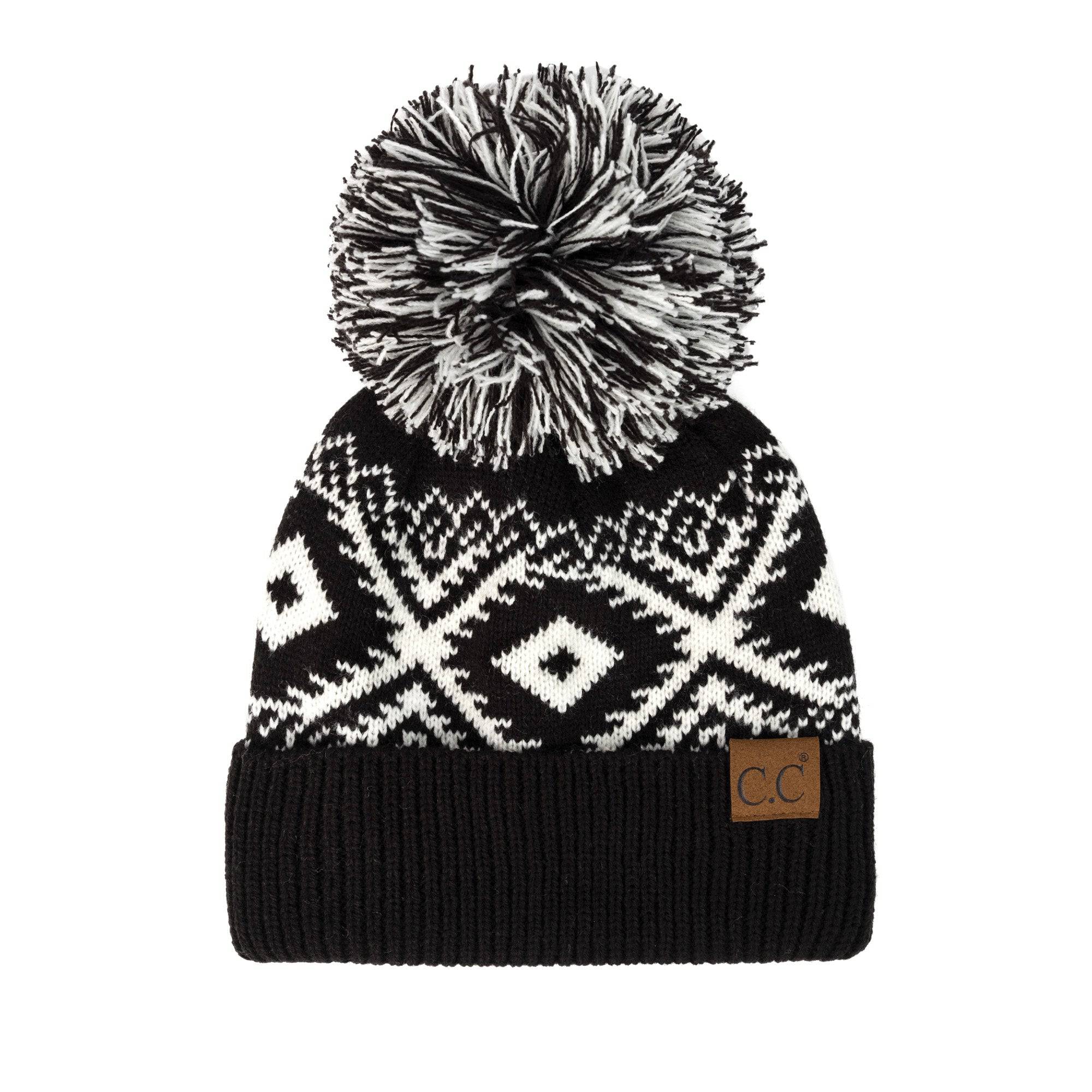 CC Western Print Beanie featuring a bold Aztec pattern and yarn pom, made from 100% acrylic for warmth and comfort.