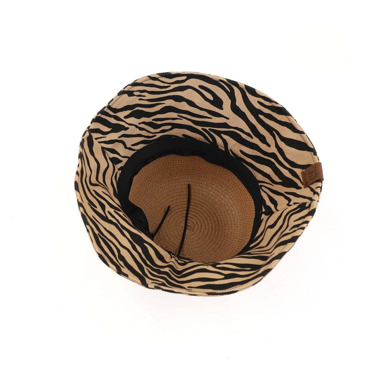 CC Zebra Print Straw Bucket Hat with adjustable inner band and stylish zebra pattern brim, perfect for sun protection and outdoor activities.