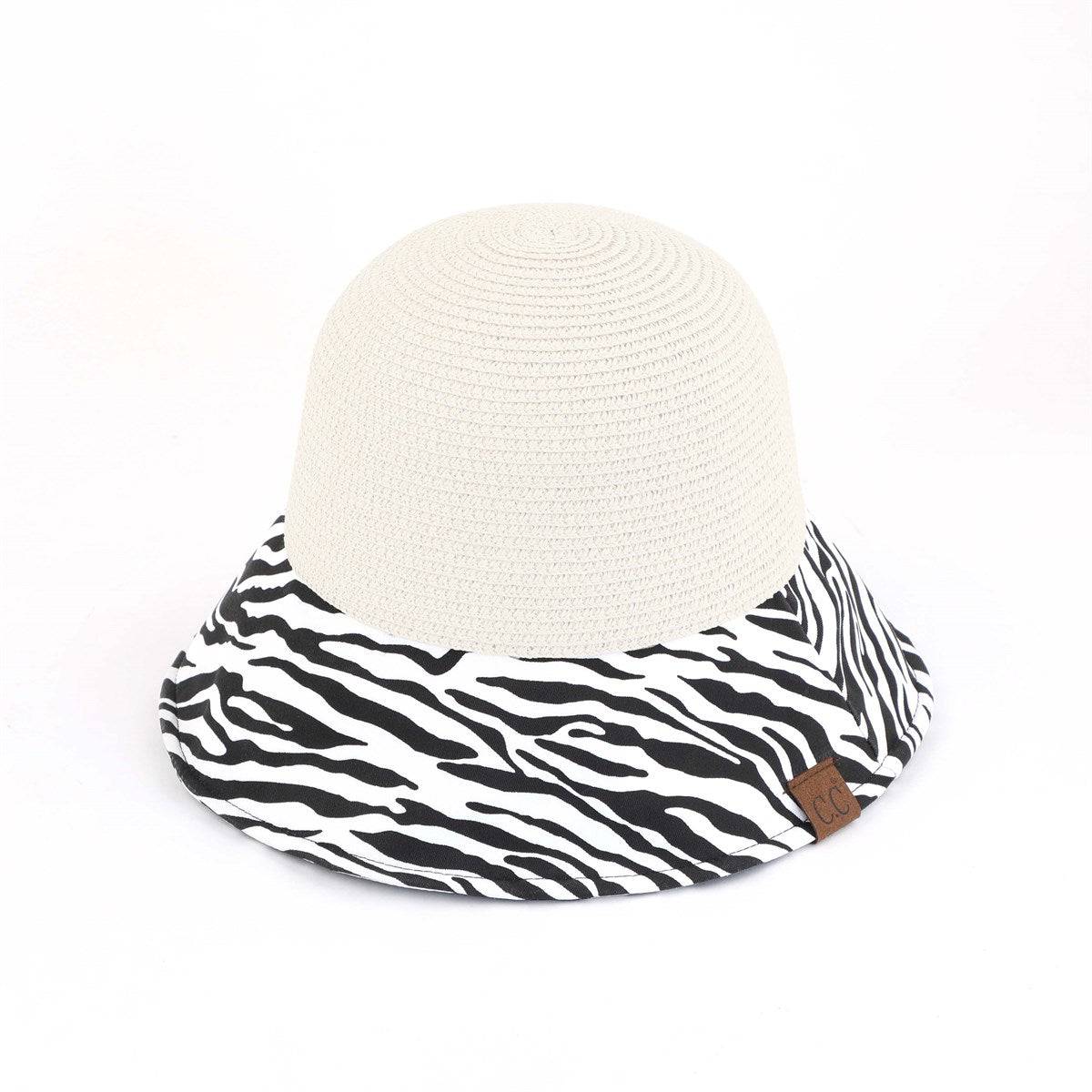 CC Zebra Print Straw Bucket Hat with adjustable inner band and stylish zebra pattern brim, perfect for sun protection and outdoor activities.