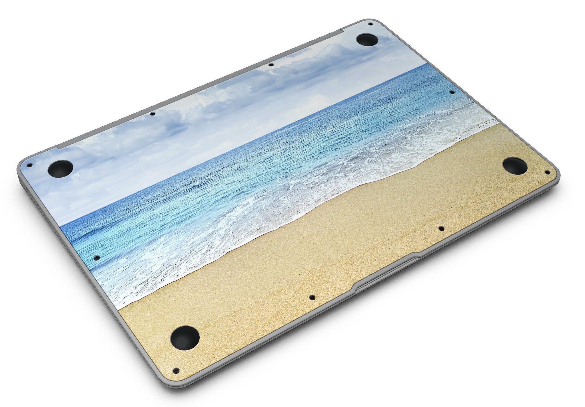 Calm Blue Sky and Sea Shore MacBook Air Skin Kit showcasing vibrant blue and sandy shore design on a sleek MacBook Air.