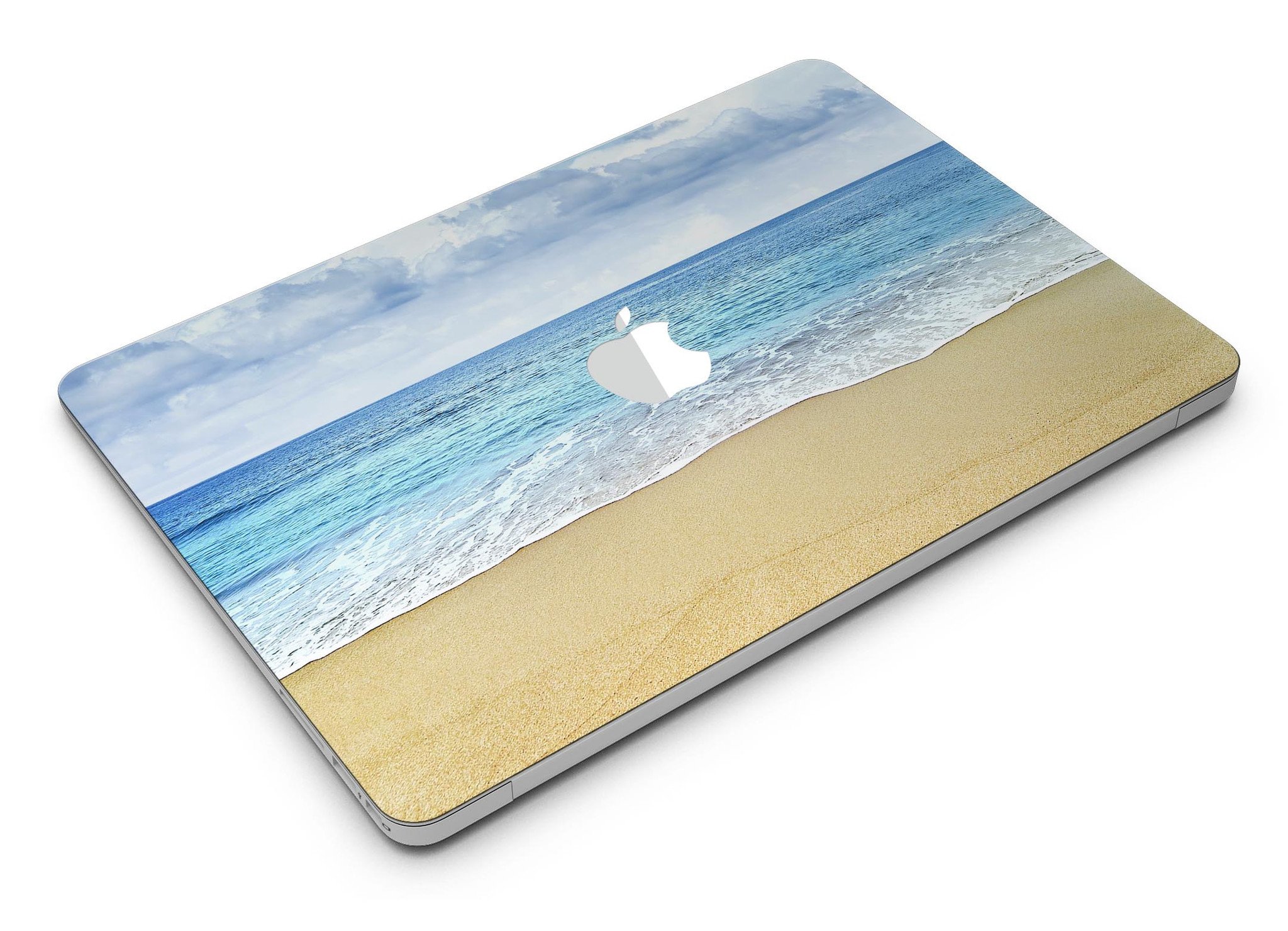 Calm Blue Sky and Sea Shore MacBook Air Skin Kit showcasing vibrant blue and sandy shore design on a sleek MacBook Air.