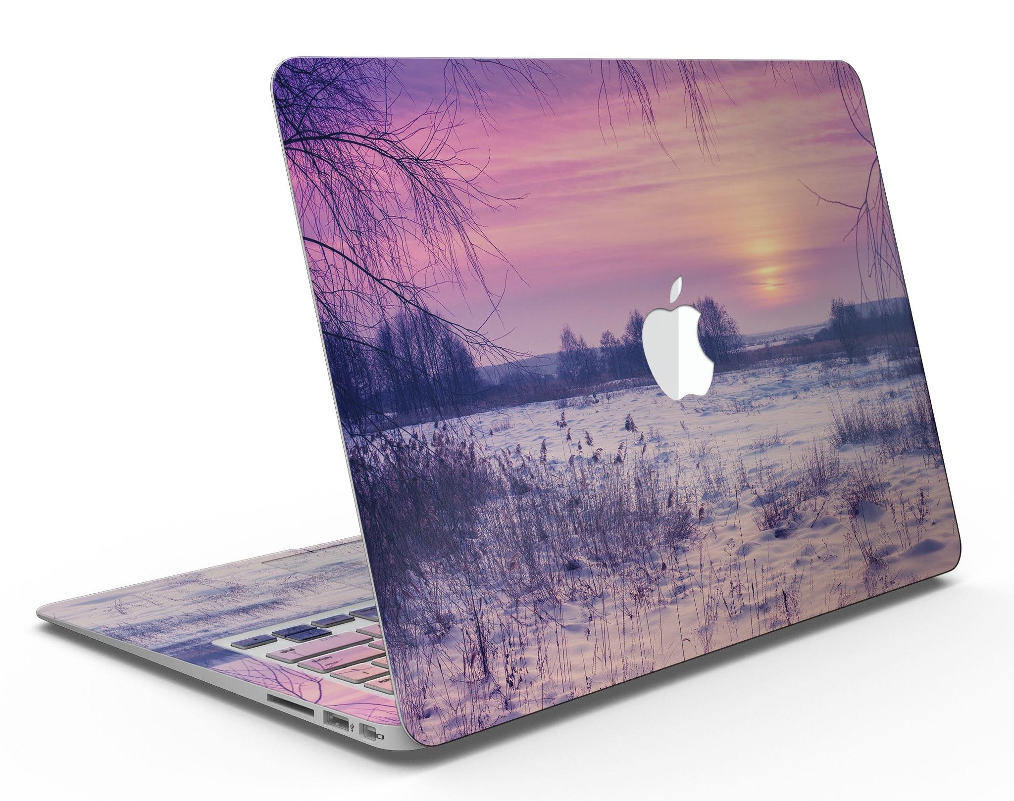 Calm Snowy Sunset MacBook Air Skin Kit showcasing a serene design with soft hues, protecting the device from scratches.