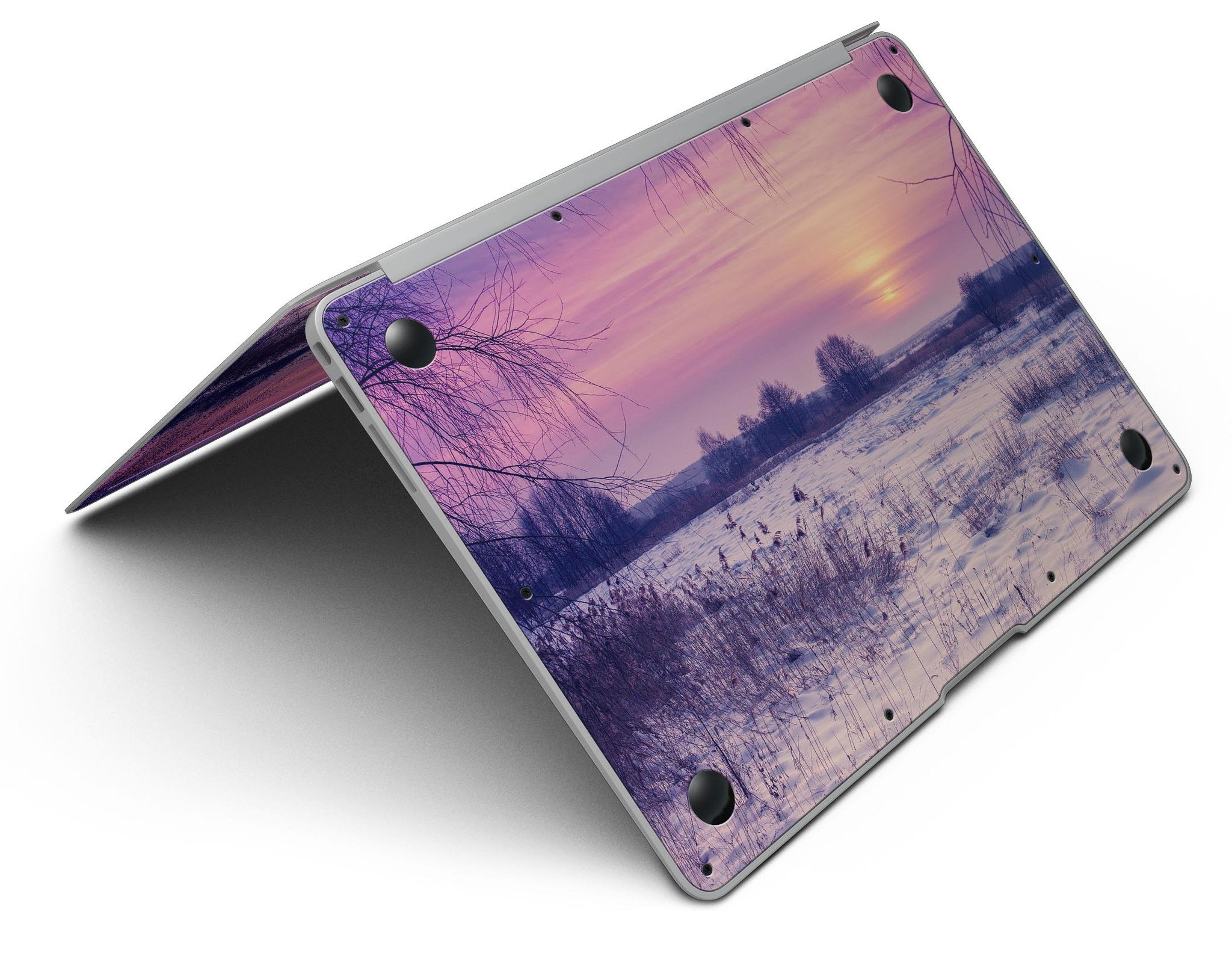 Calm Snowy Sunset MacBook Air Skin Kit showcasing a serene design with soft hues, protecting the device from scratches.