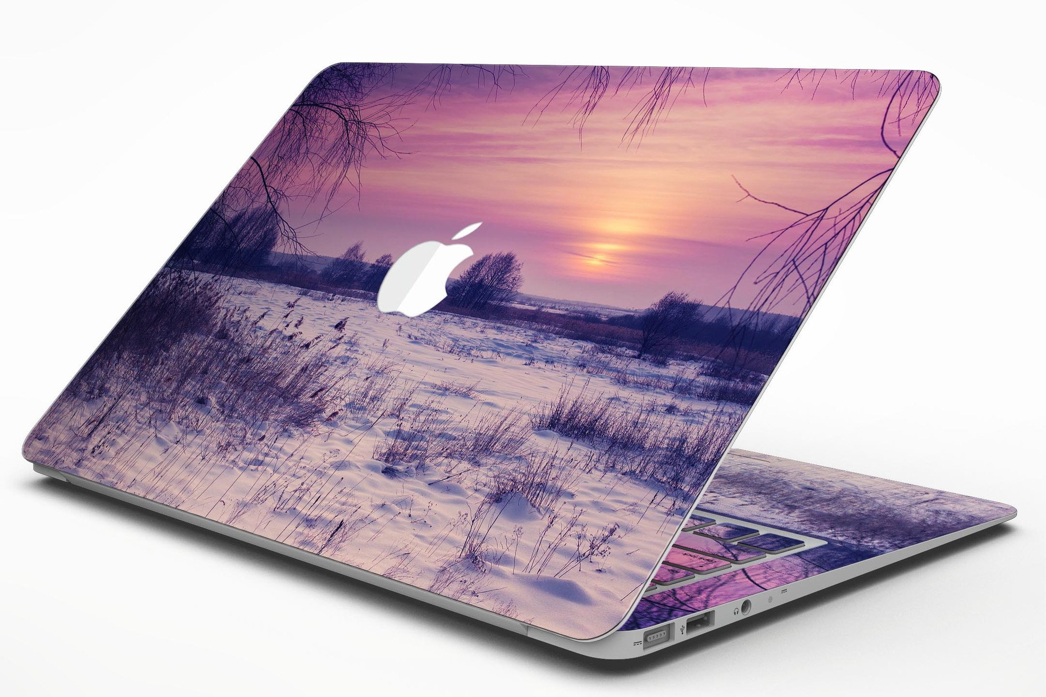 Calm Snowy Sunset MacBook Air Skin Kit showcasing a serene design with soft hues, protecting the device from scratches.