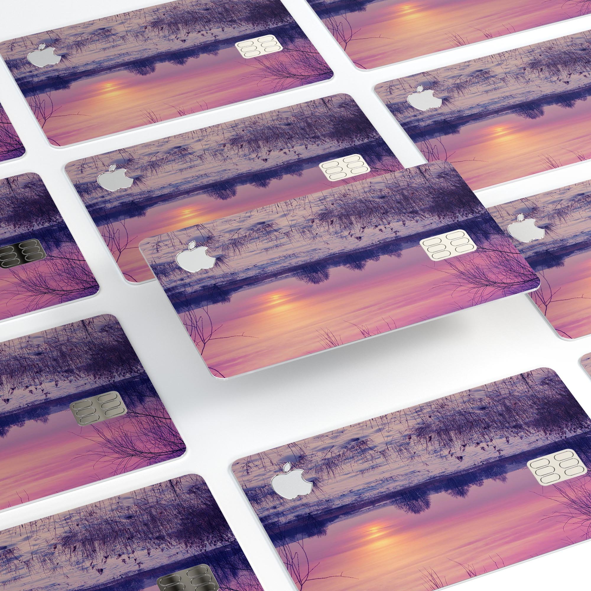 Calm Snowy Sunset decal skin for Apple Card, showcasing a beautiful design with premium vinyl material.