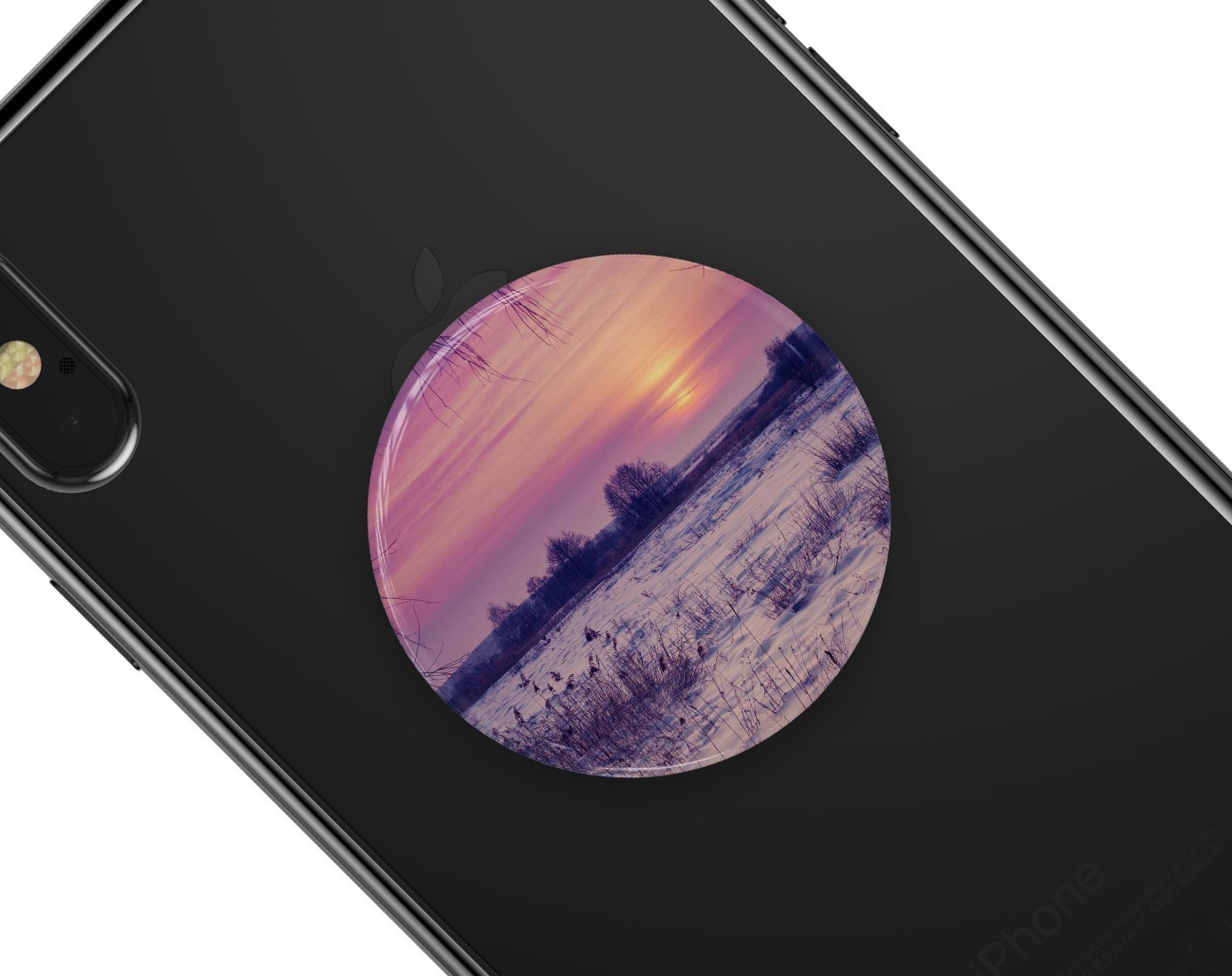 Calm Snowy Sunset Skin Kit for PopSockets, showcasing a serene snowy landscape design on a smartphone grip.