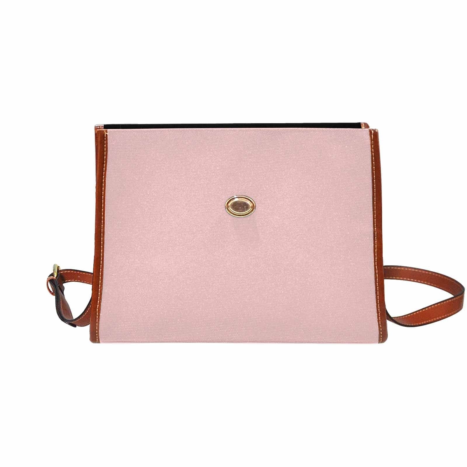 Canvas Bag in Rose Quartz Red with brown strap, featuring waterproof material and adjustable shoulder strap.