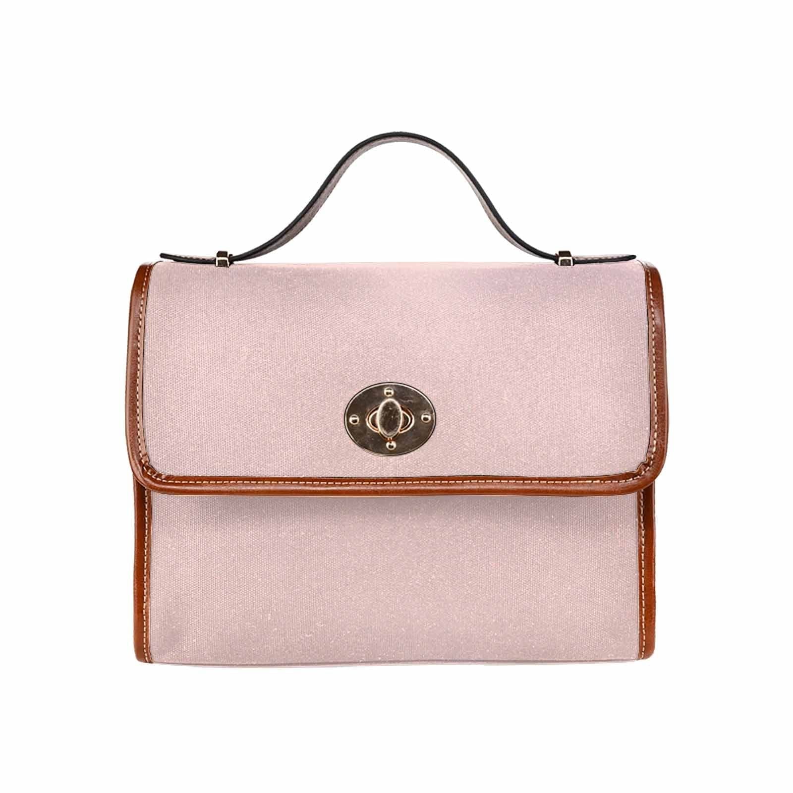 Stylish Canvas Bag in Scallop Seashell Pink with brown strap, featuring two interior pockets and a removable adjustable shoulder strap.