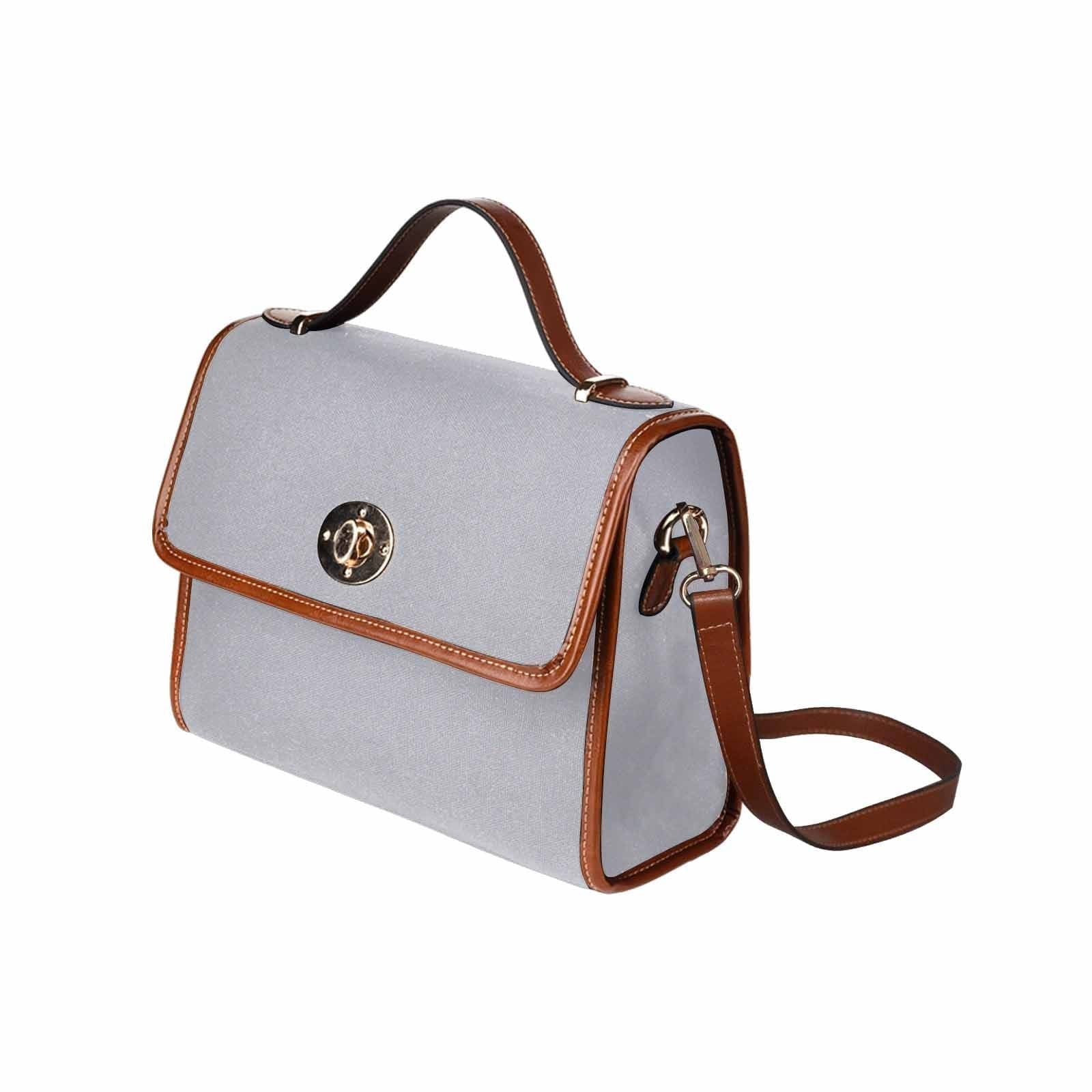 Slate Gray Canvas Bag with brown strap, featuring waterproof material and adjustable shoulder strap.