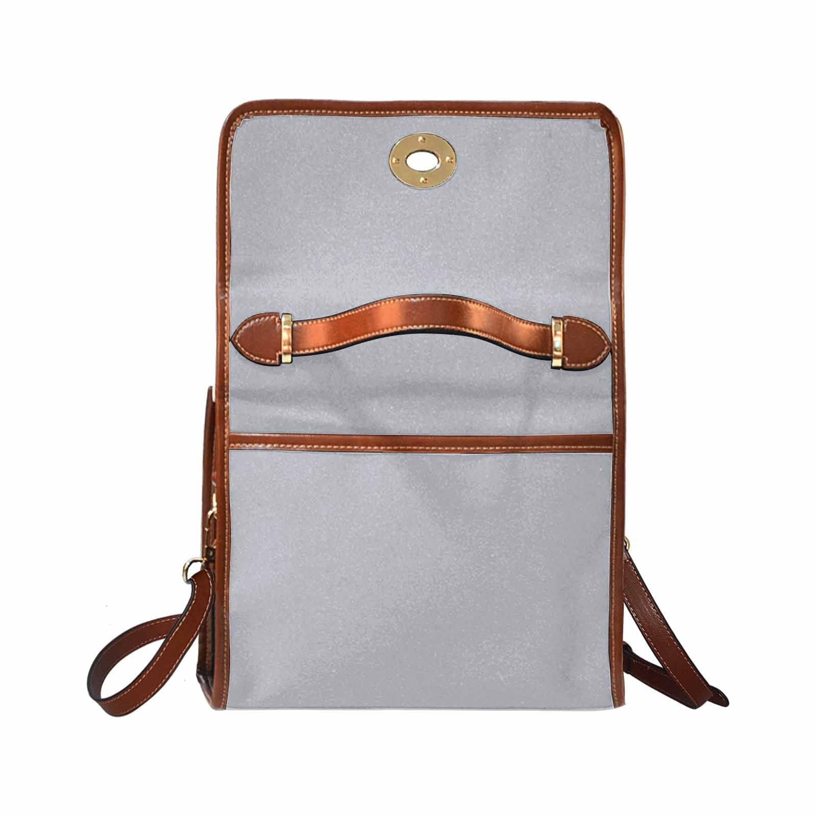 Slate Gray Canvas Bag with brown strap, featuring waterproof material and adjustable shoulder strap.