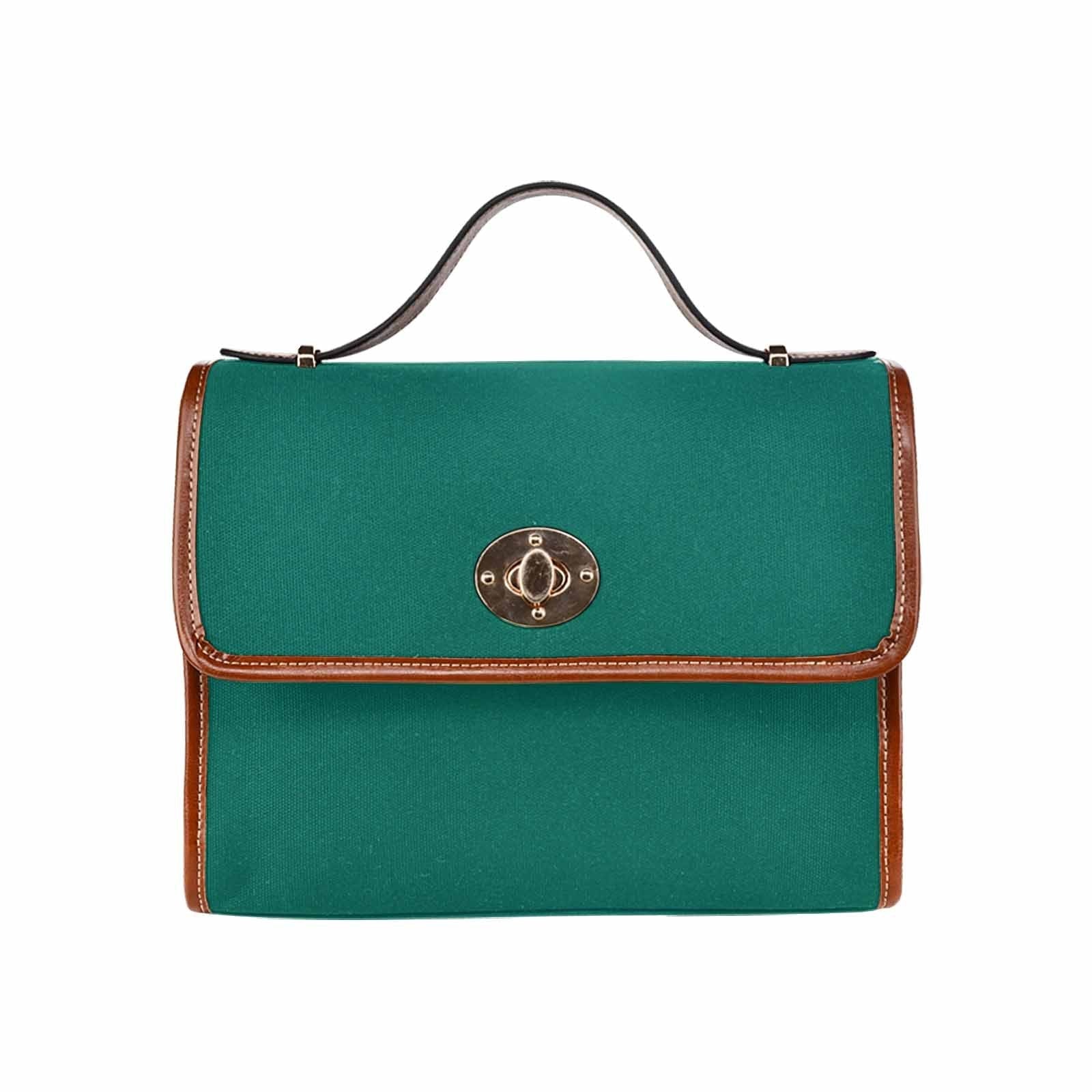 Teal green canvas bag with brown strap, featuring two interior pockets and a zipper pocket, perfect for versatile use.