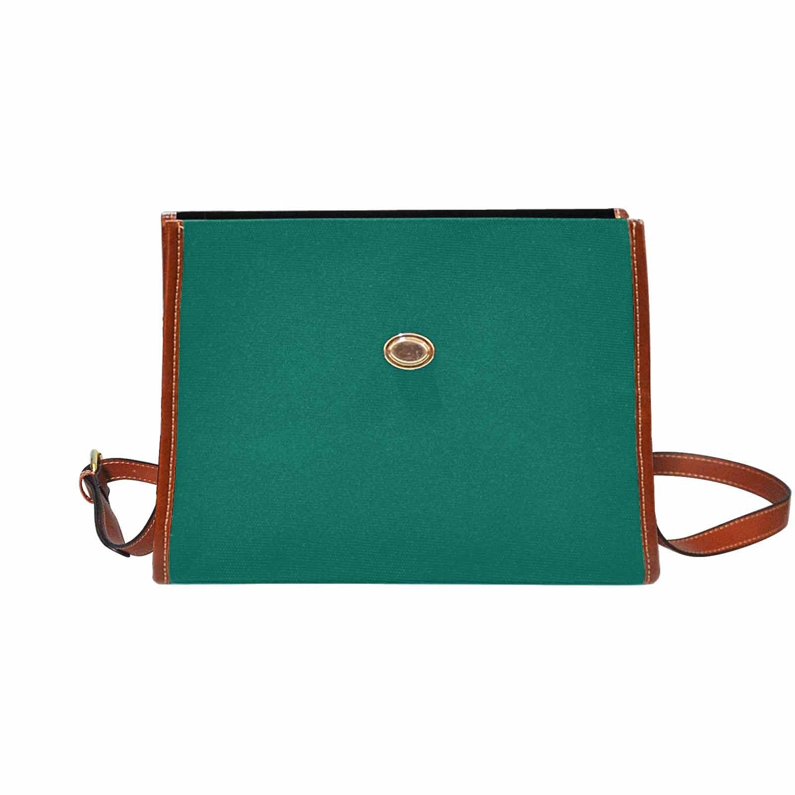 Teal green canvas bag with brown strap, featuring two interior pockets and a zipper pocket, perfect for versatile use.