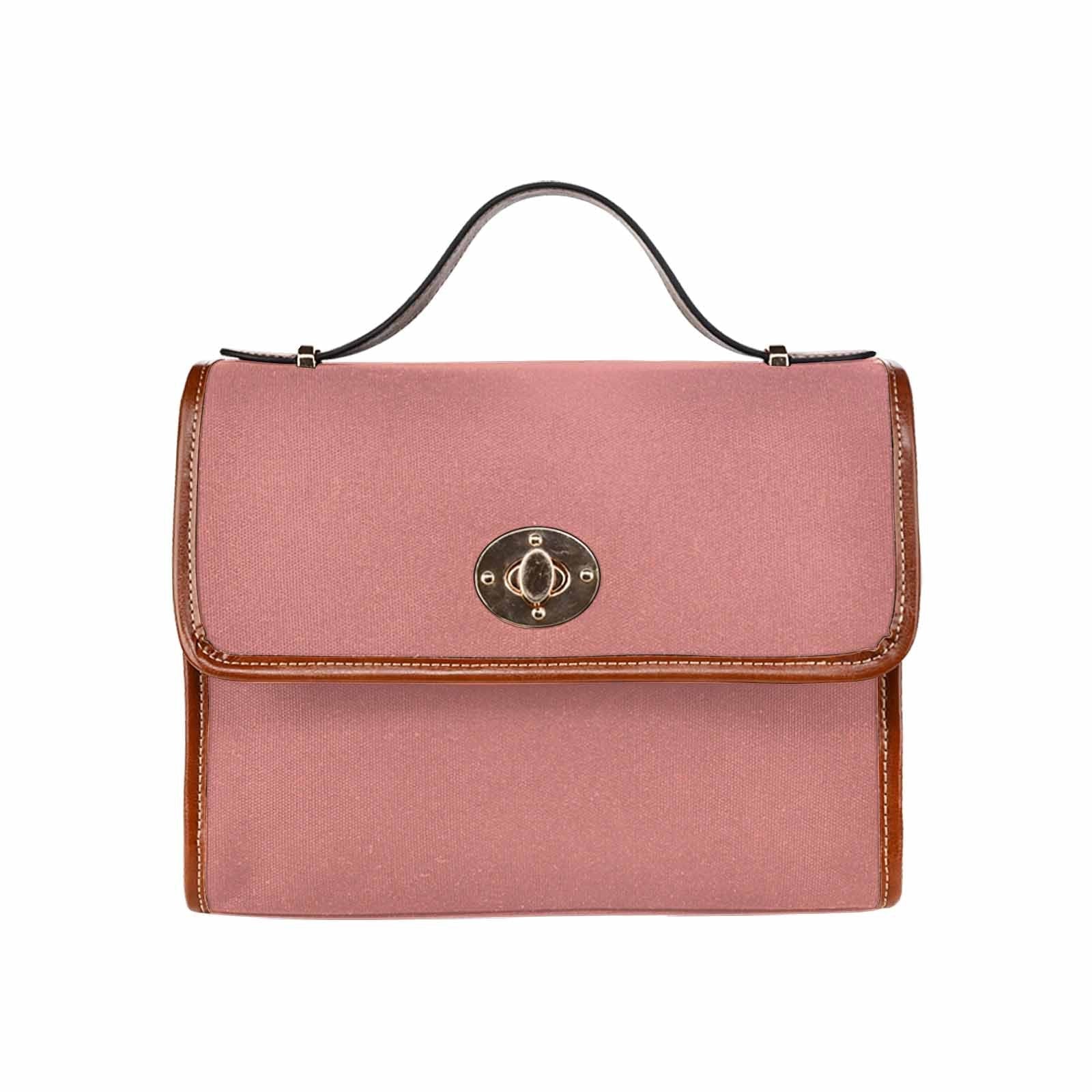 Stylish Canvas Bag in Tiger Lily Pink with brown strap, featuring two interior pockets and a zipper pocket, perfect for everyday use.