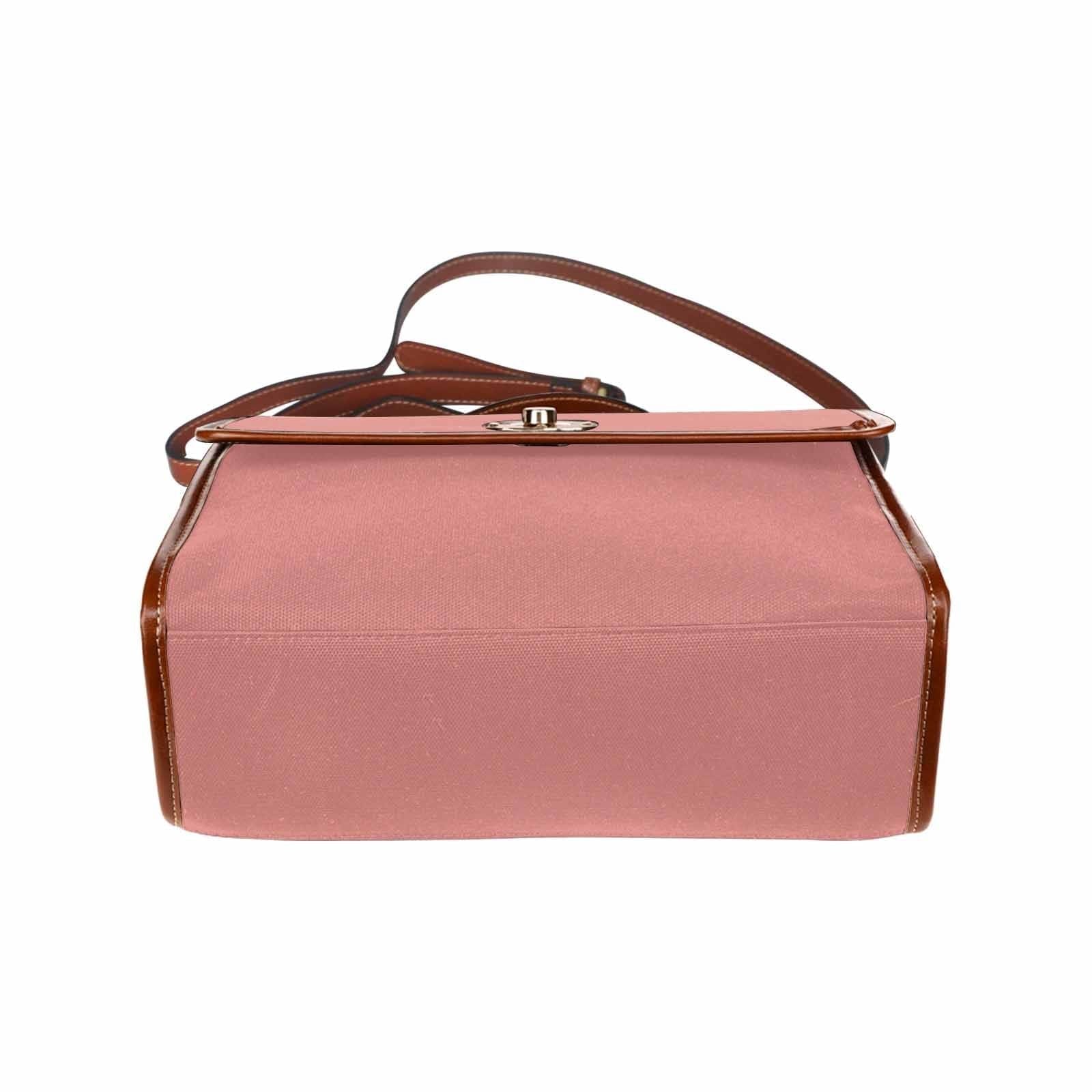 Stylish Canvas Bag in Tiger Lily Pink with brown strap, featuring two interior pockets and a zipper pocket, perfect for everyday use.