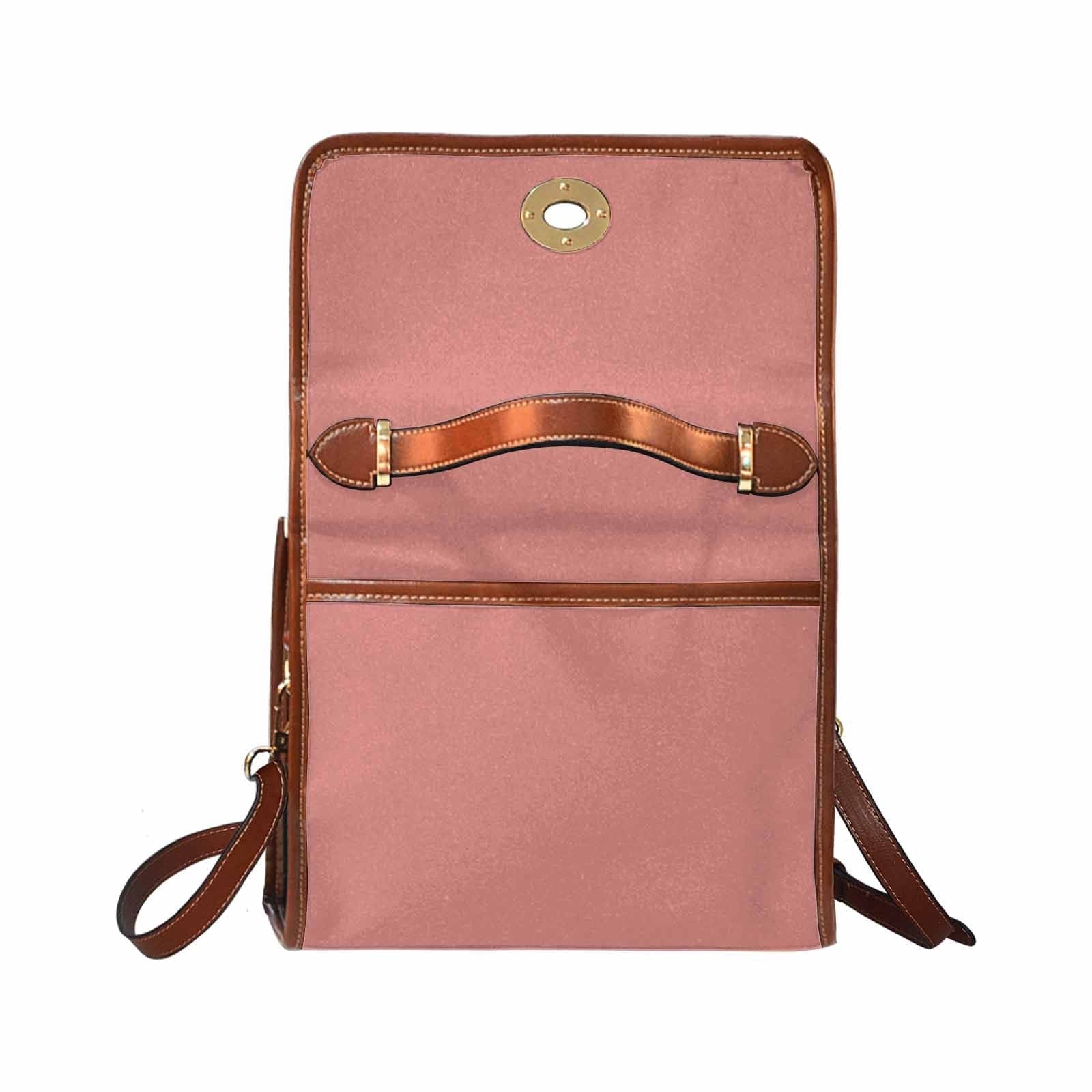 Stylish Canvas Bag in Tiger Lily Pink with brown strap, featuring two interior pockets and a zipper pocket, perfect for everyday use.