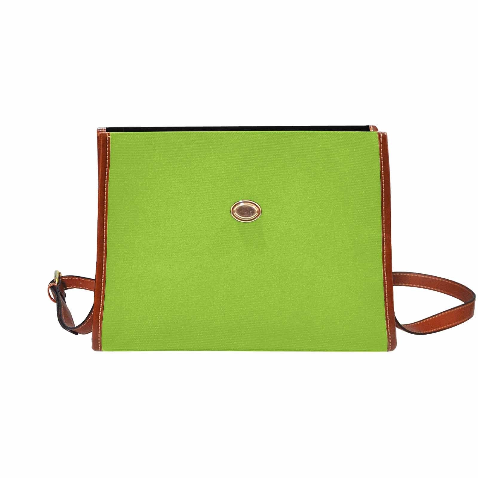 Yellow green canvas bag with brown strap, featuring two interior pockets and adjustable shoulder strap, perfect for various uses.