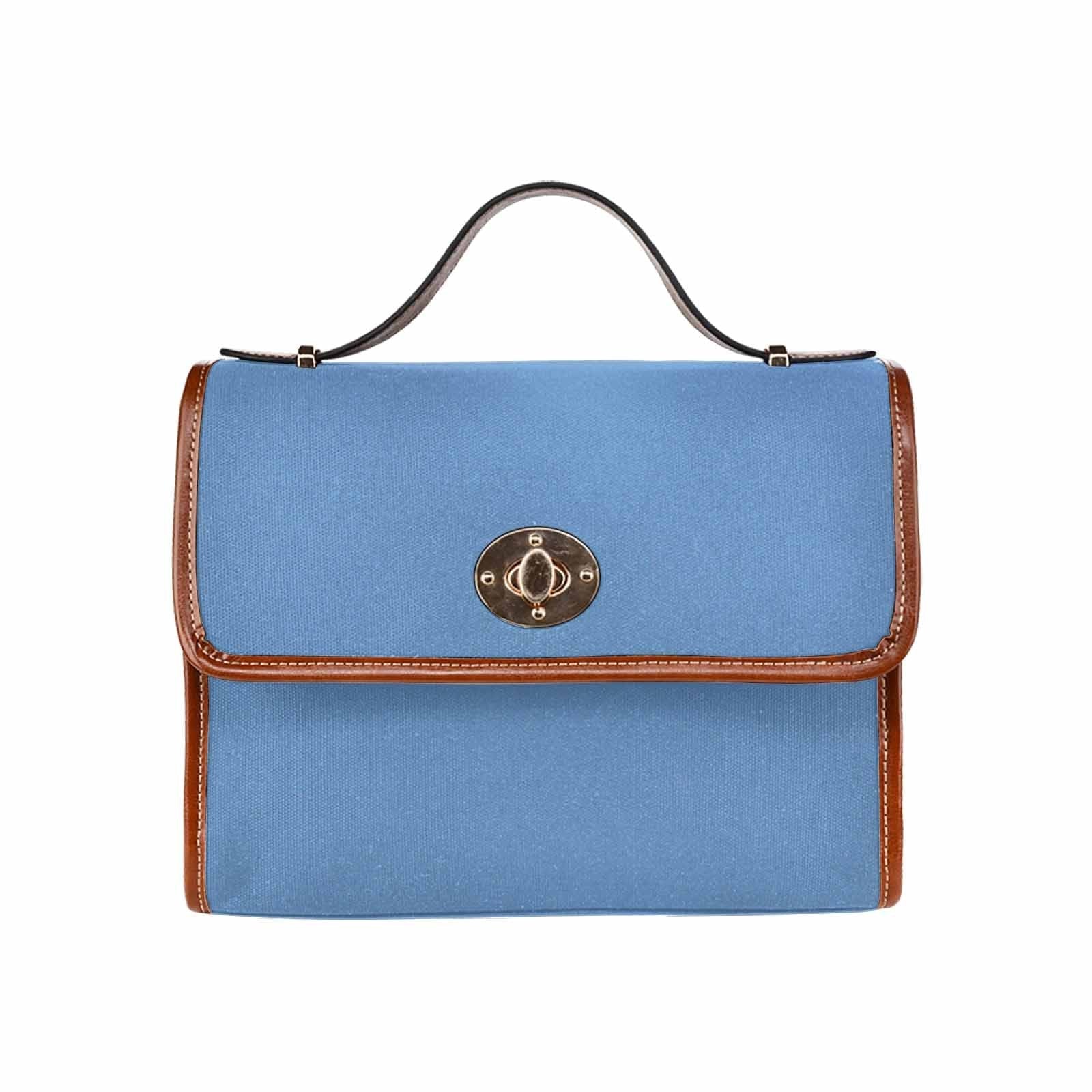 Canvas Handbag in blue gray with brown crossbody strap, showcasing waterproof material and stylish design.