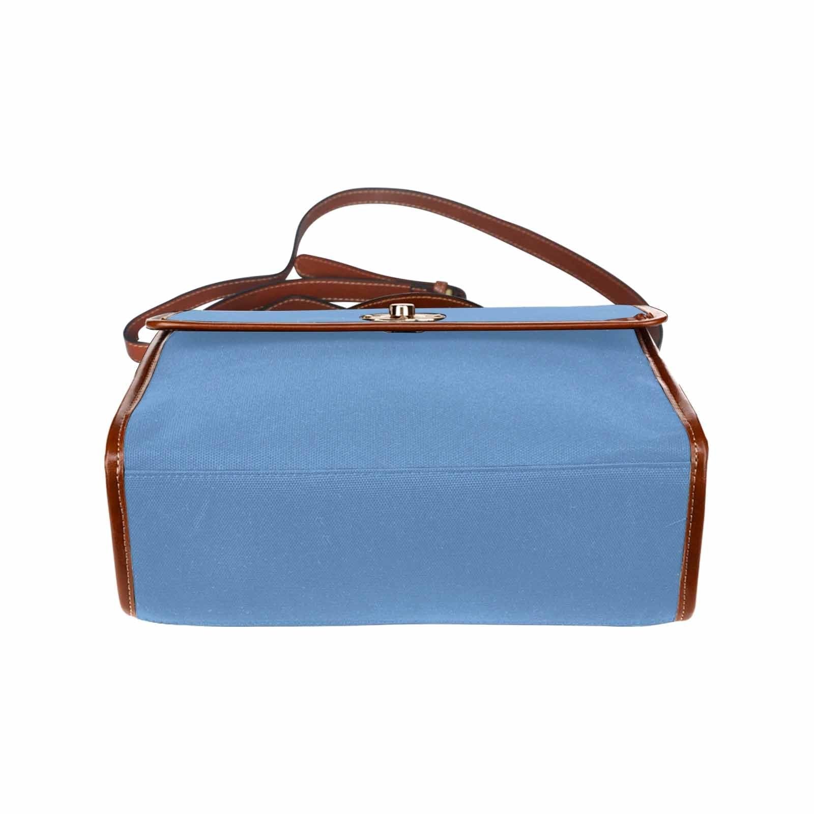 Canvas Handbag in blue gray with brown crossbody strap, showcasing waterproof material and stylish design.