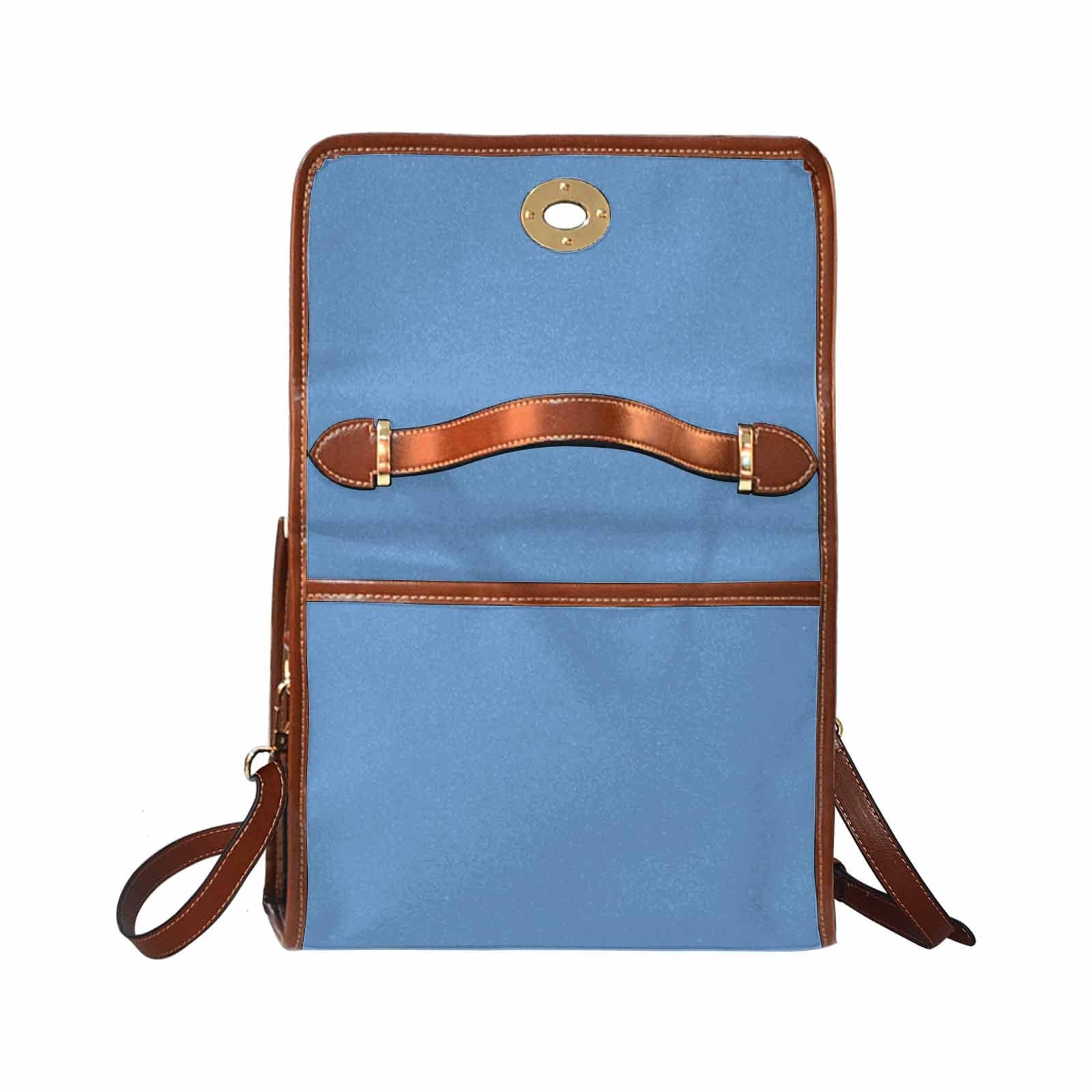 Canvas Handbag in blue gray with brown crossbody strap, showcasing waterproof material and stylish design.