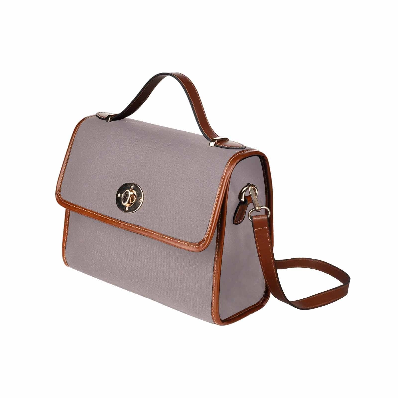 Canvas Handbag in Coffee Brown with brown crossbody strap, showcasing its waterproof material and stylish design.