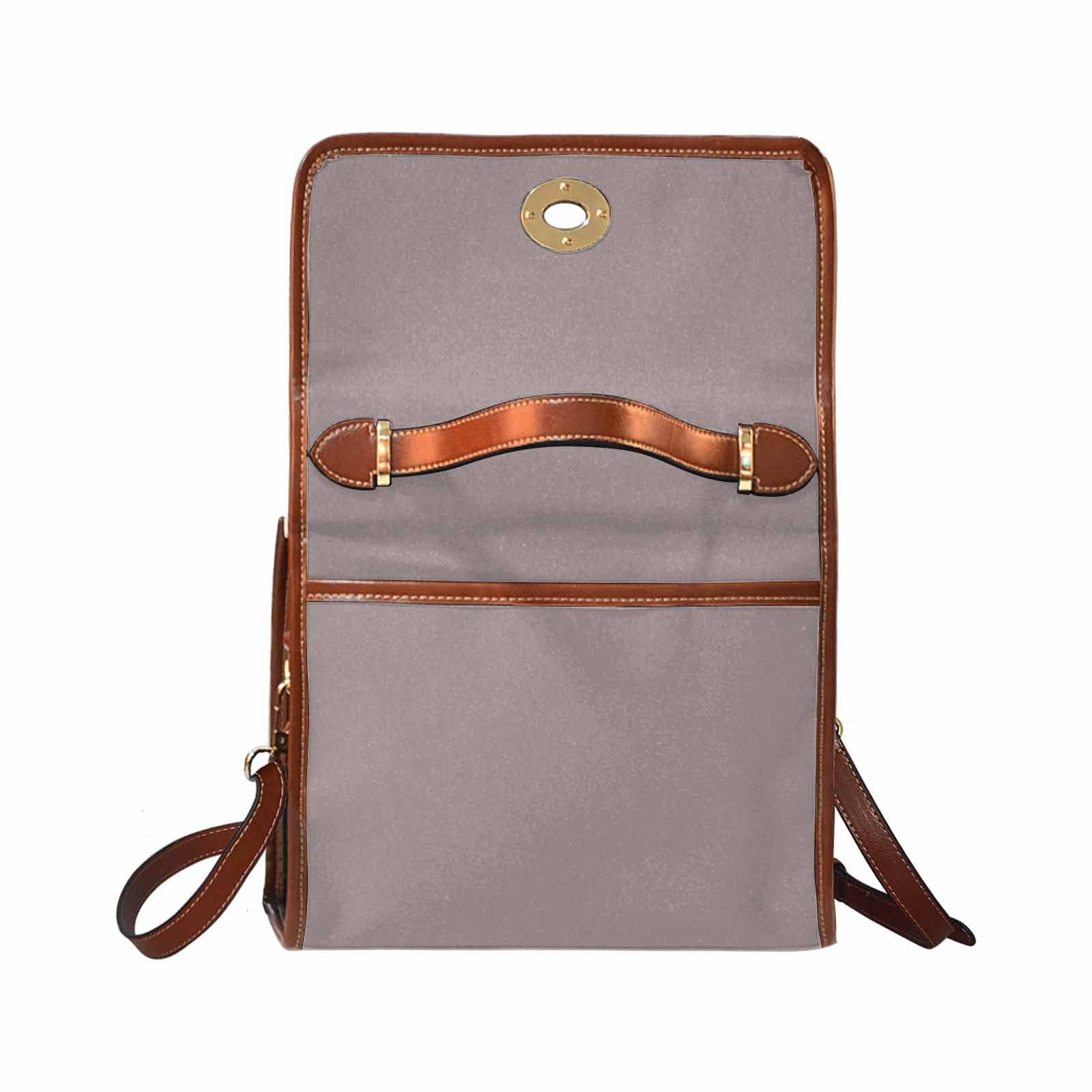 Canvas Handbag in Coffee Brown with brown crossbody strap, showcasing its waterproof material and stylish design.