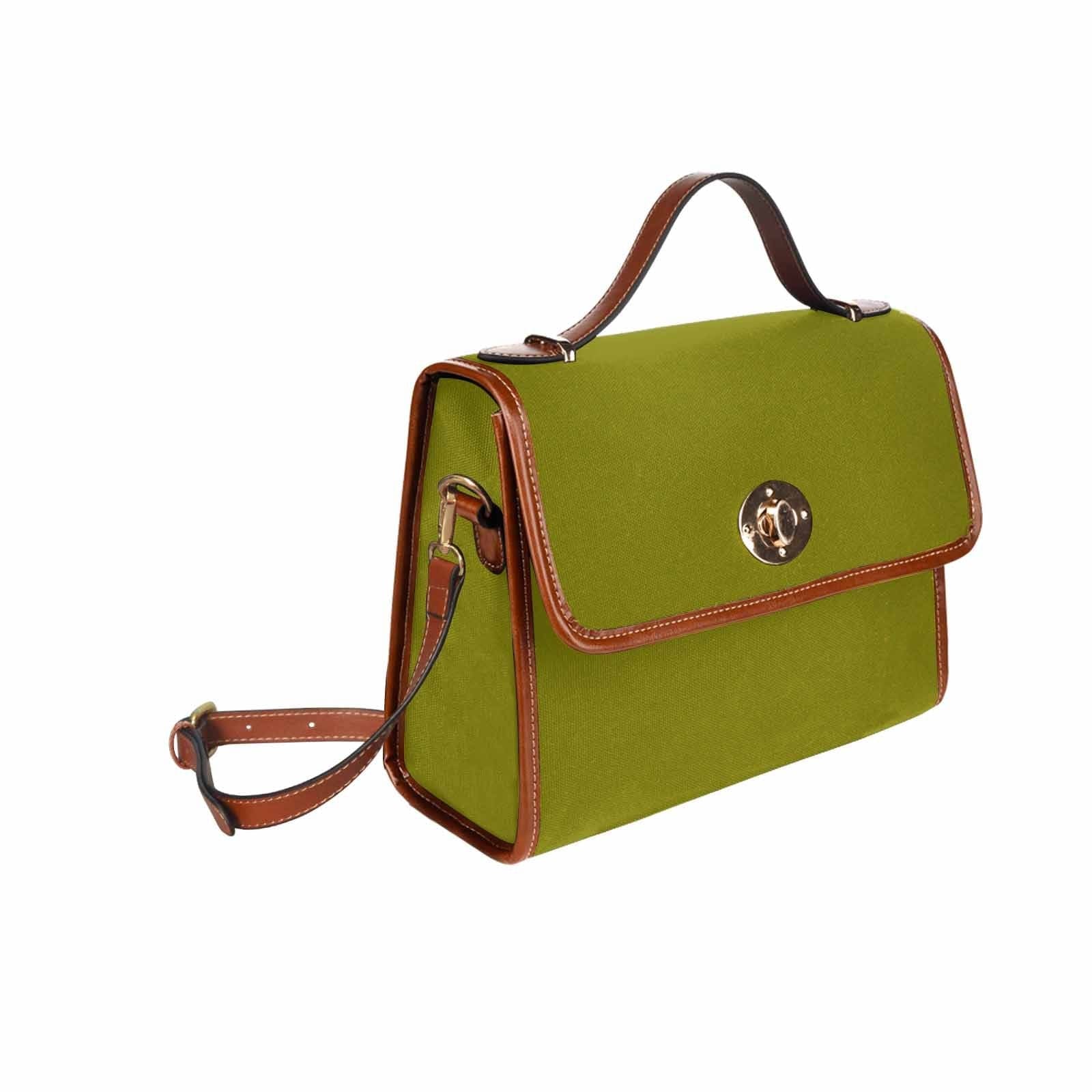 Dark olive green canvas handbag with brown crossbody strap, featuring two interior pockets and a zipper pocket.