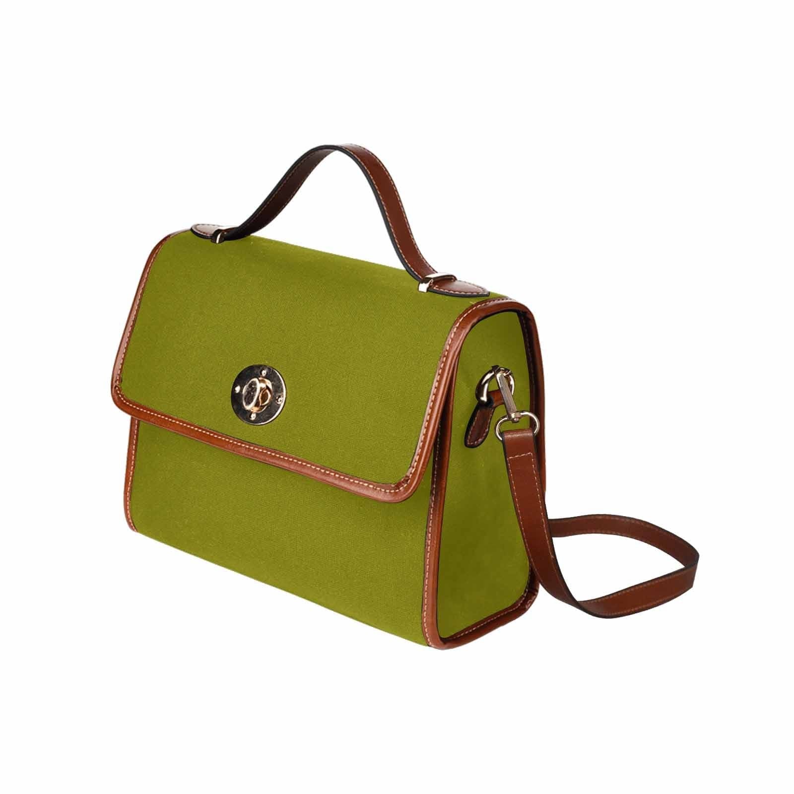 Dark olive green canvas handbag with brown crossbody strap, featuring two interior pockets and a zipper pocket.