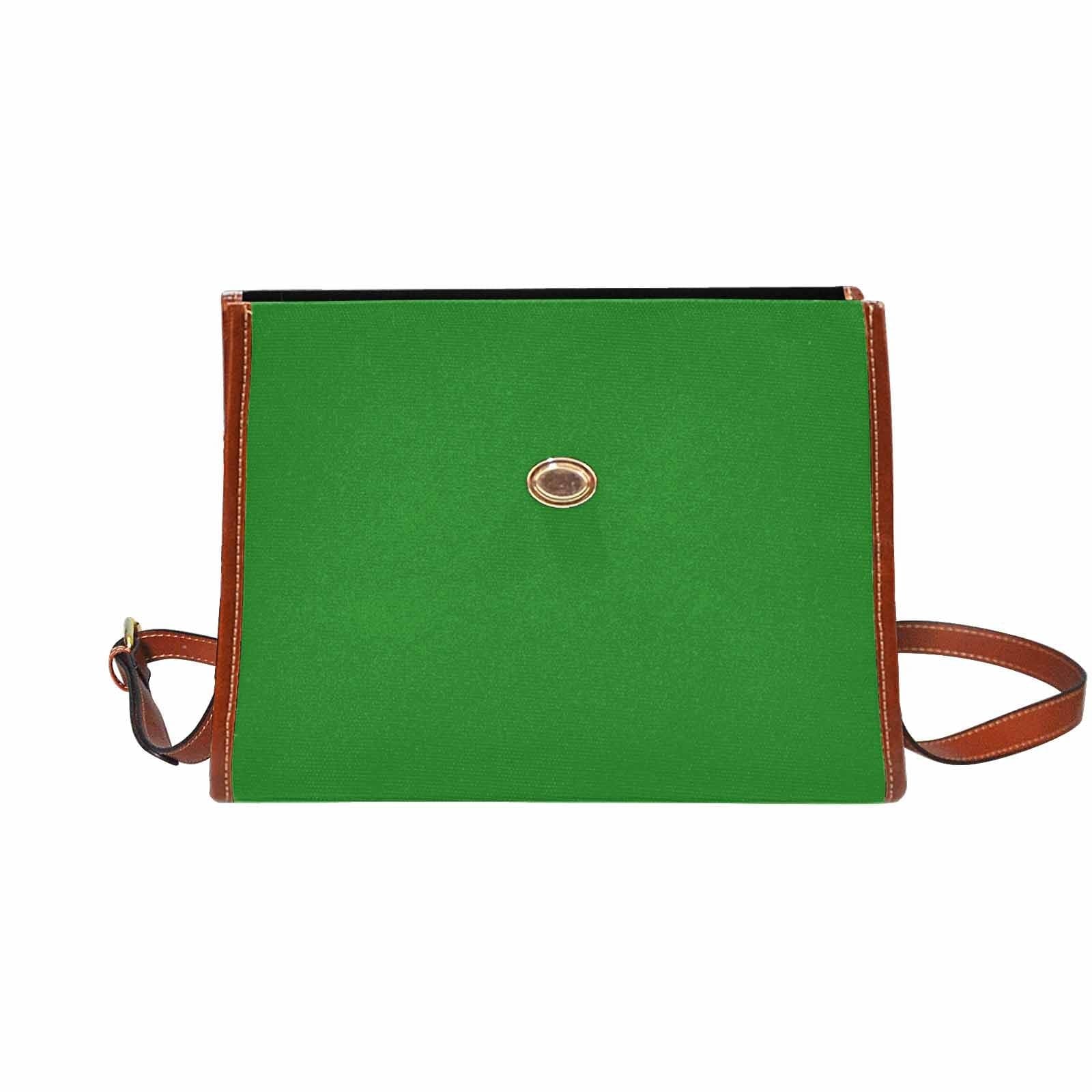 Forest green canvas handbag with brown crossbody strap, featuring two interior pockets and a zipper pocket.