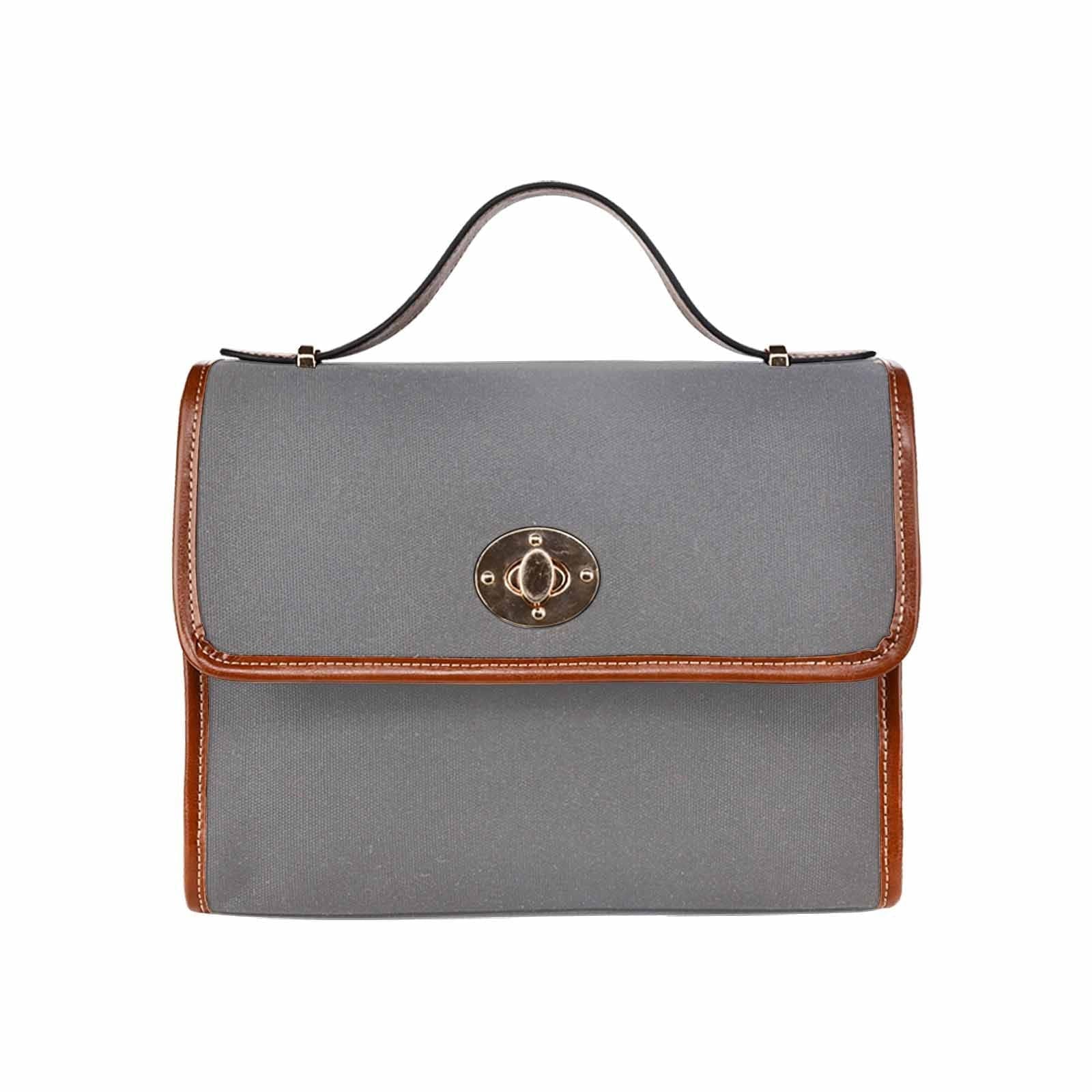 Gray waterproof canvas handbag with brown crossbody strap, featuring two interior pockets and a zipper pocket.