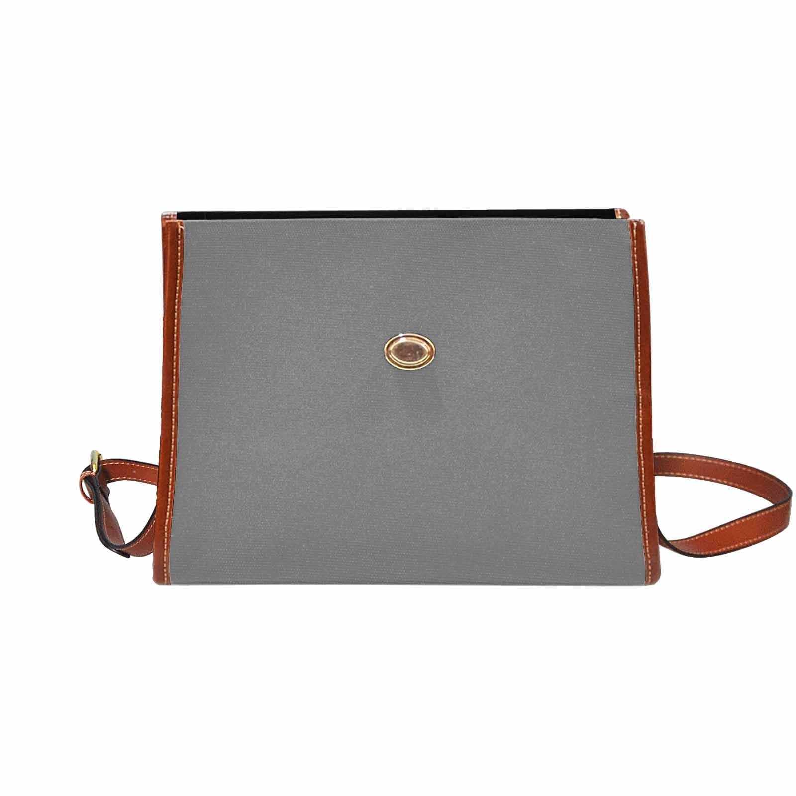 Gray waterproof canvas handbag with brown crossbody strap, featuring two interior pockets and a zipper pocket.