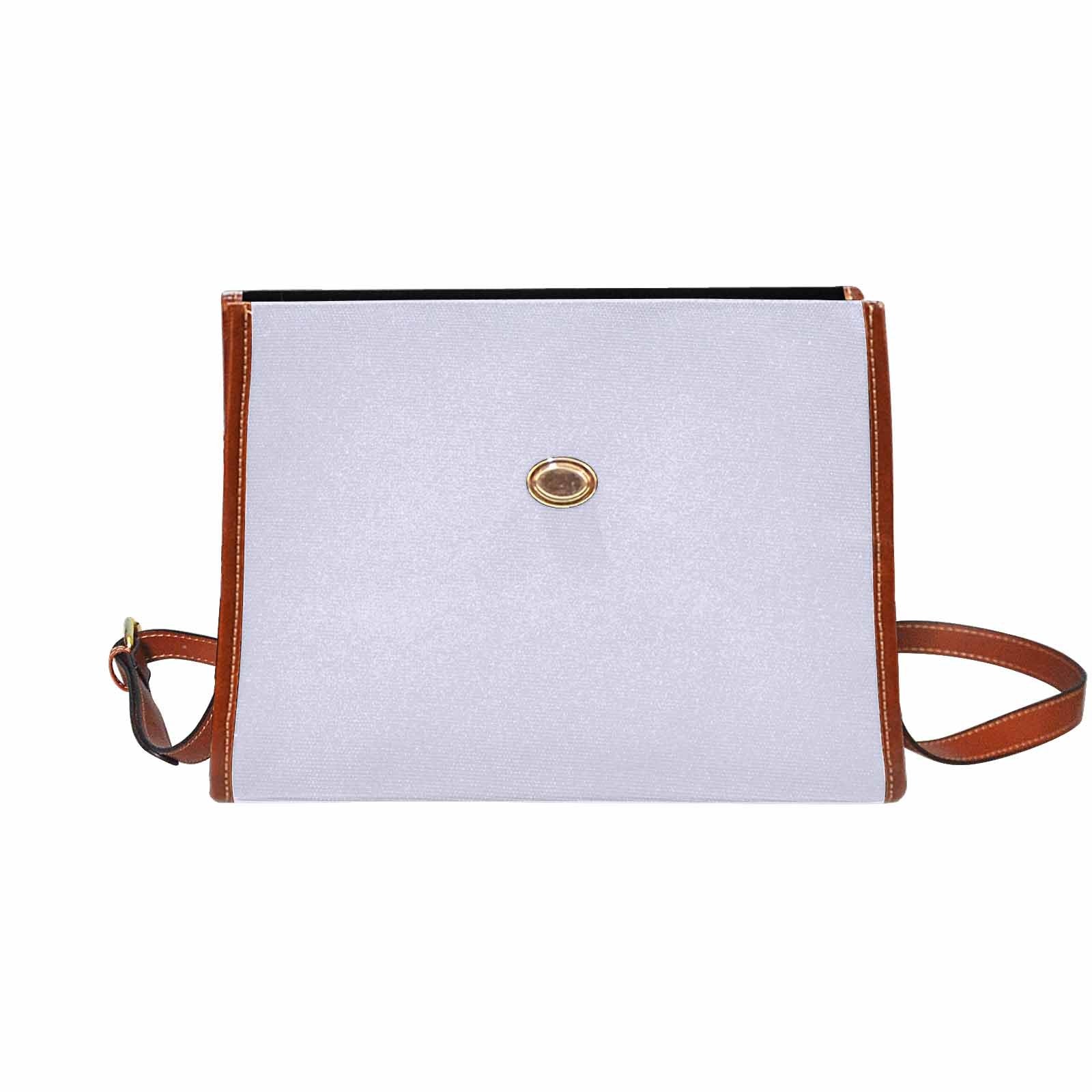 Lavender purple canvas handbag with brown crossbody strap, showcasing its stylish design and functional pockets.