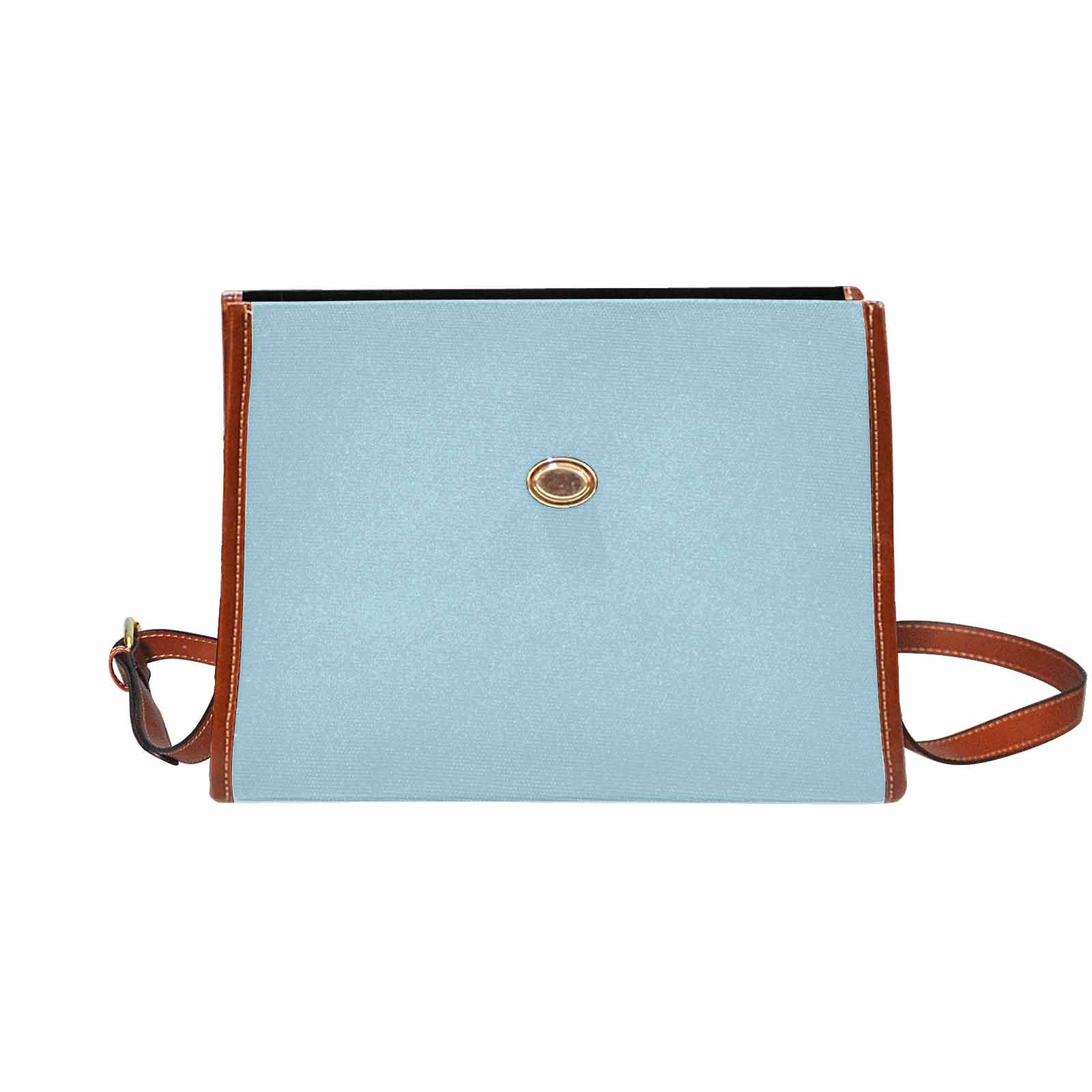 Light blue waterproof canvas handbag with brown crossbody strap, featuring two interior pockets and a zipper pocket.