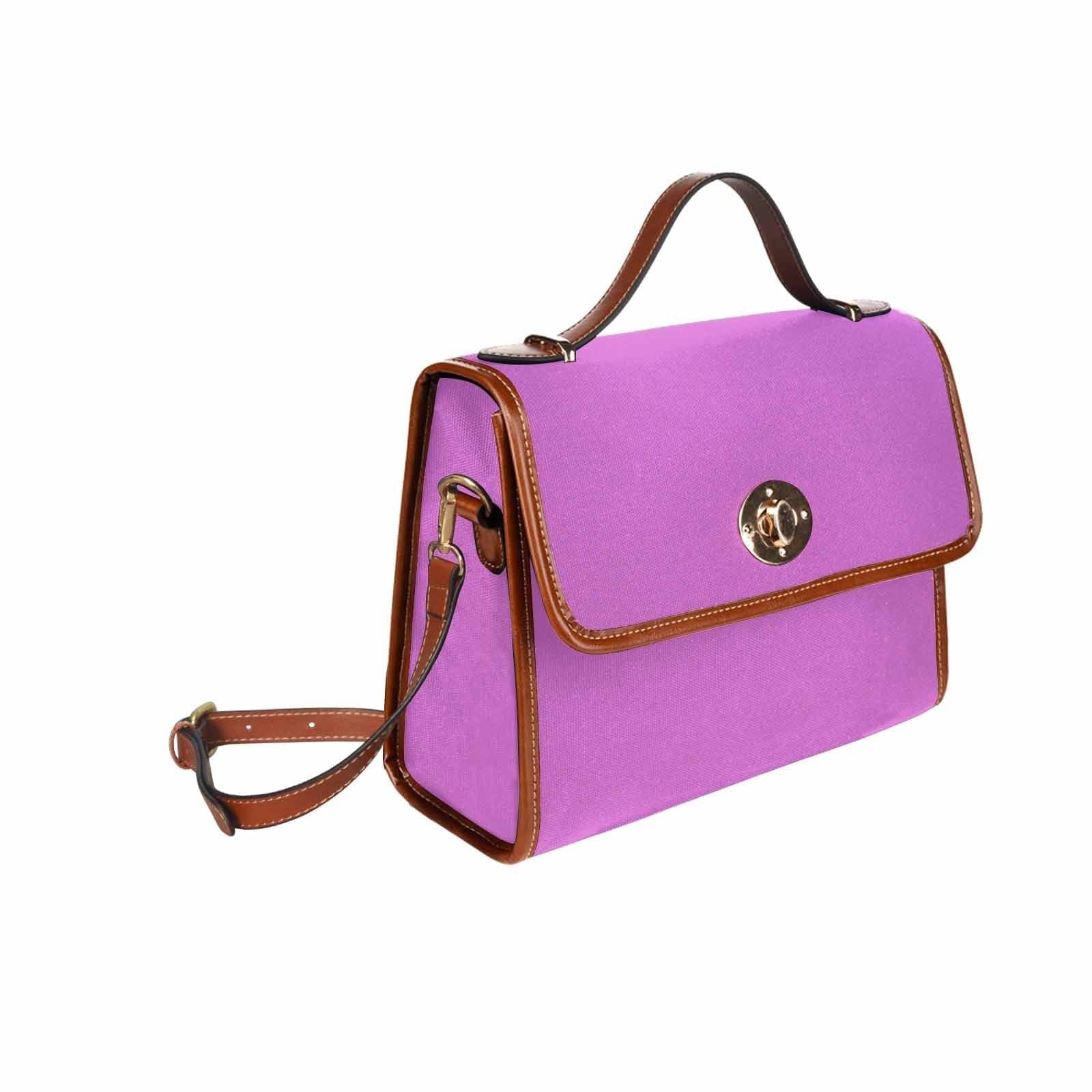 Orchid Purple Canvas Handbag with brown crossbody strap, showcasing its waterproof design and stylish appearance.