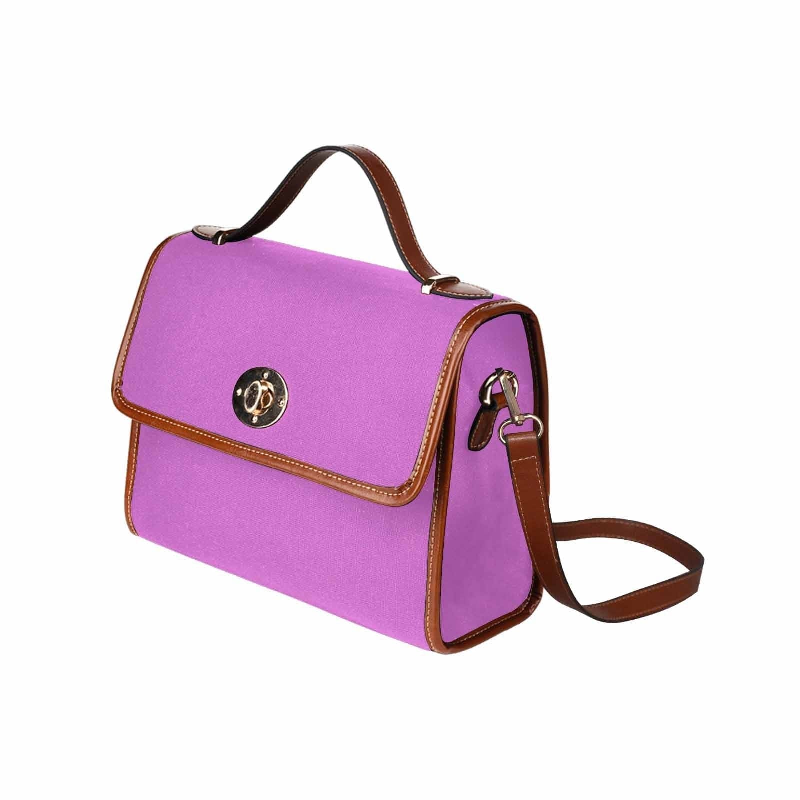 Orchid Purple Canvas Handbag with brown crossbody strap, showcasing its waterproof design and stylish appearance.