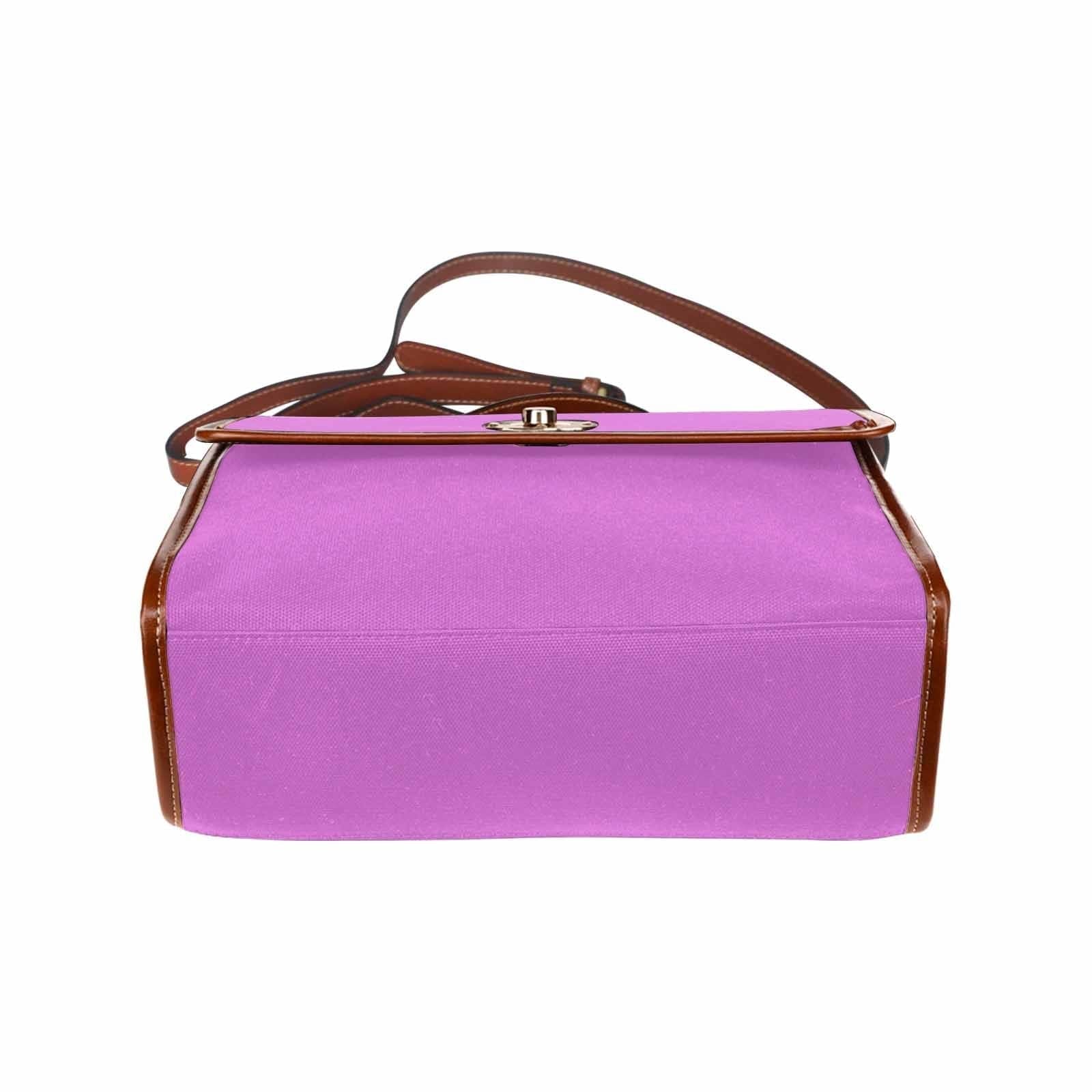 Orchid Purple Canvas Handbag with brown crossbody strap, showcasing its waterproof design and stylish appearance.