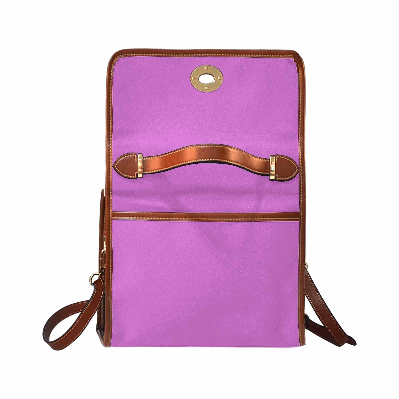 Orchid Purple Canvas Handbag with brown crossbody strap, showcasing its waterproof design and stylish appearance.