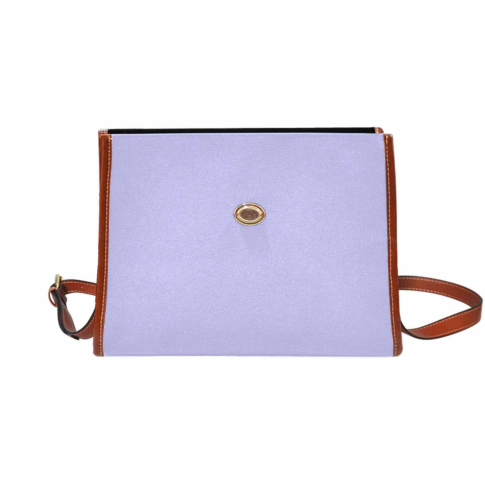 Stylish periwinkle purple canvas handbag with brown crossbody strap, showcasing its durable design and spacious interior.