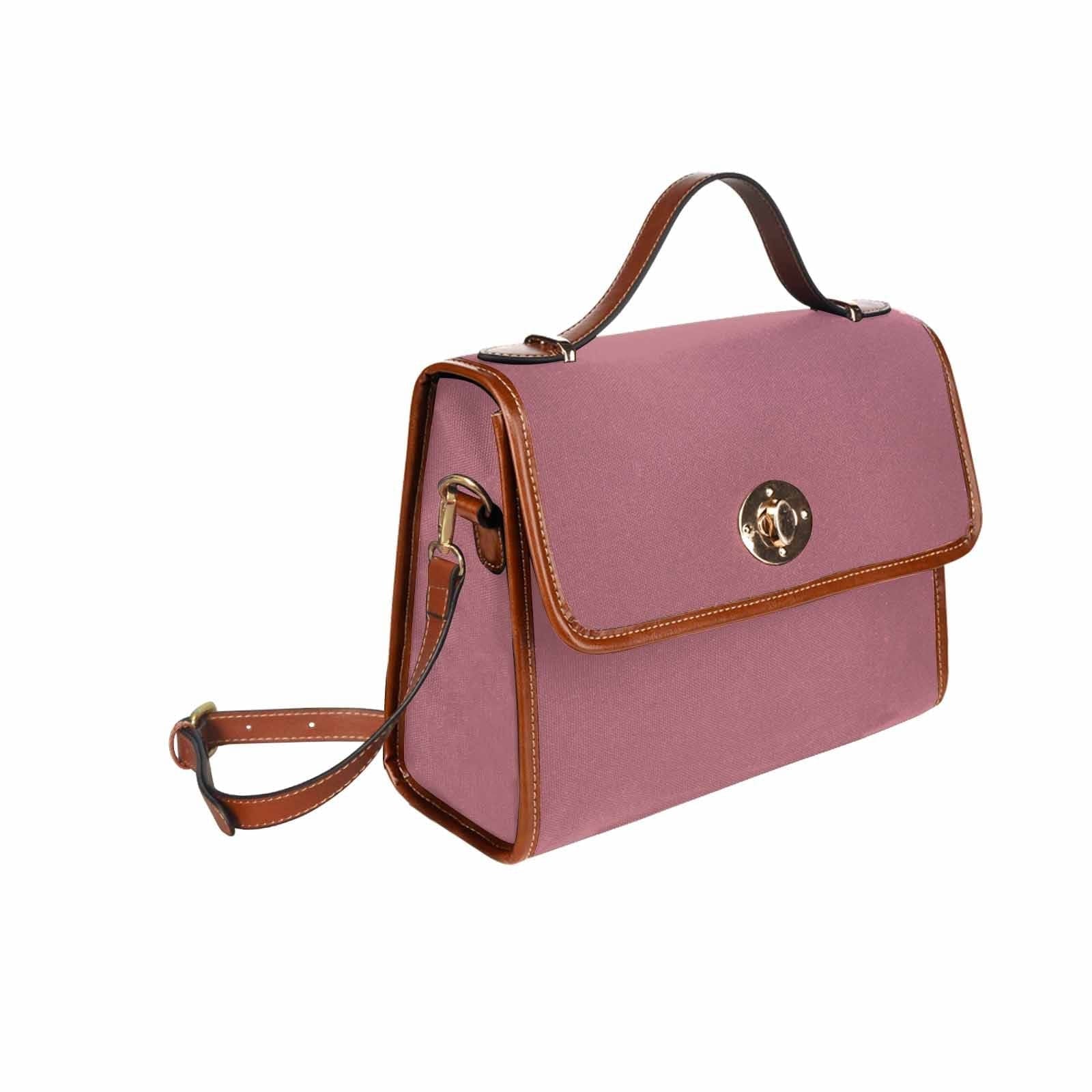 Stylish Canvas Handbag in Rose Gold Red with brown crossbody strap, showcasing its waterproof design and spacious interior.