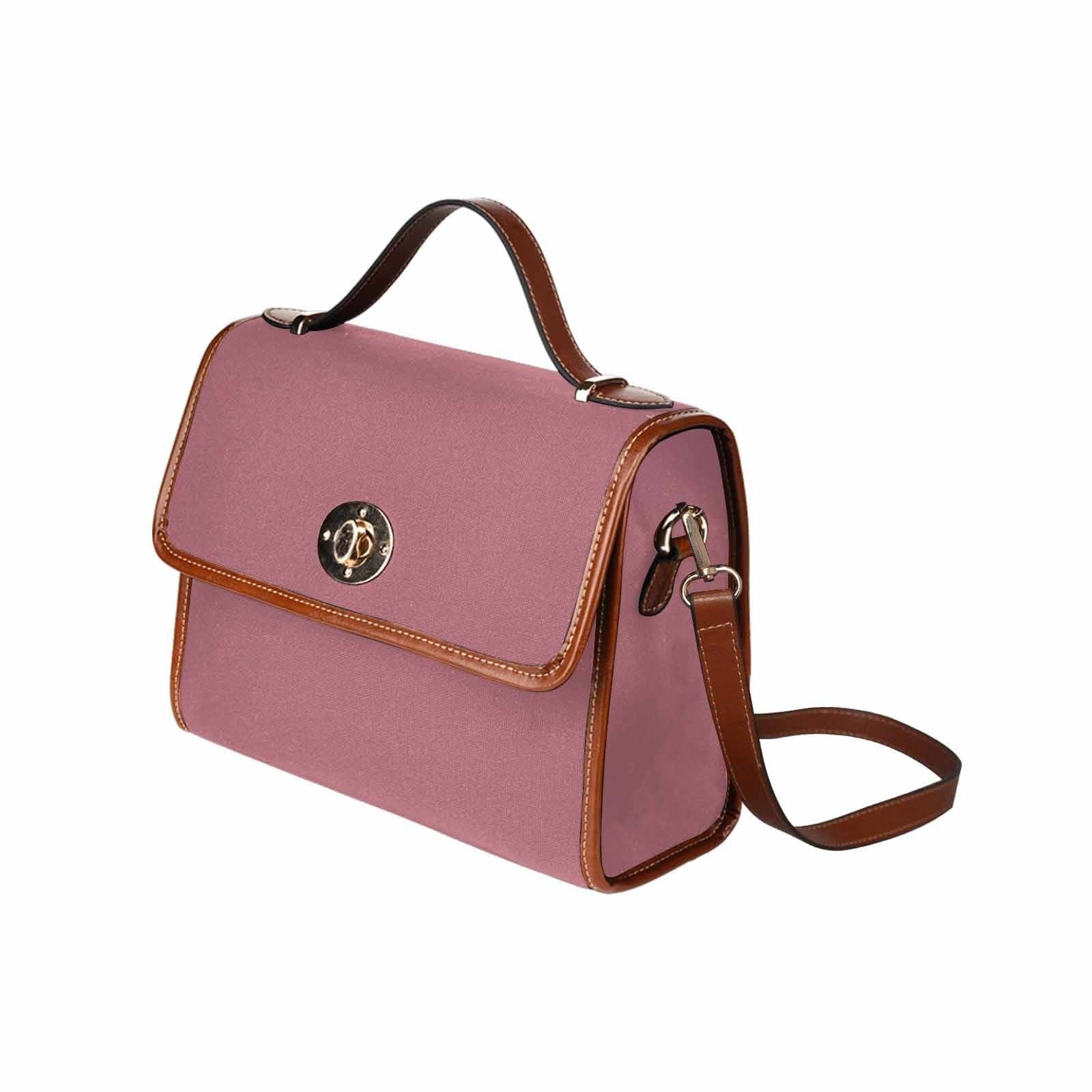 Stylish Canvas Handbag in Rose Gold Red with brown crossbody strap, showcasing its waterproof design and spacious interior.