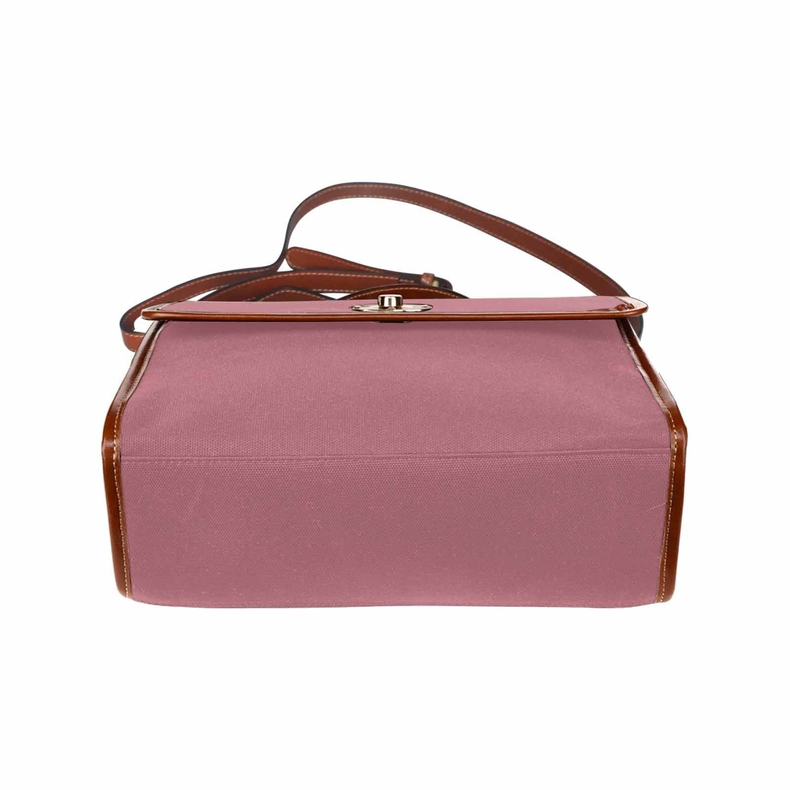 Stylish Canvas Handbag in Rose Gold Red with brown crossbody strap, showcasing its waterproof design and spacious interior.