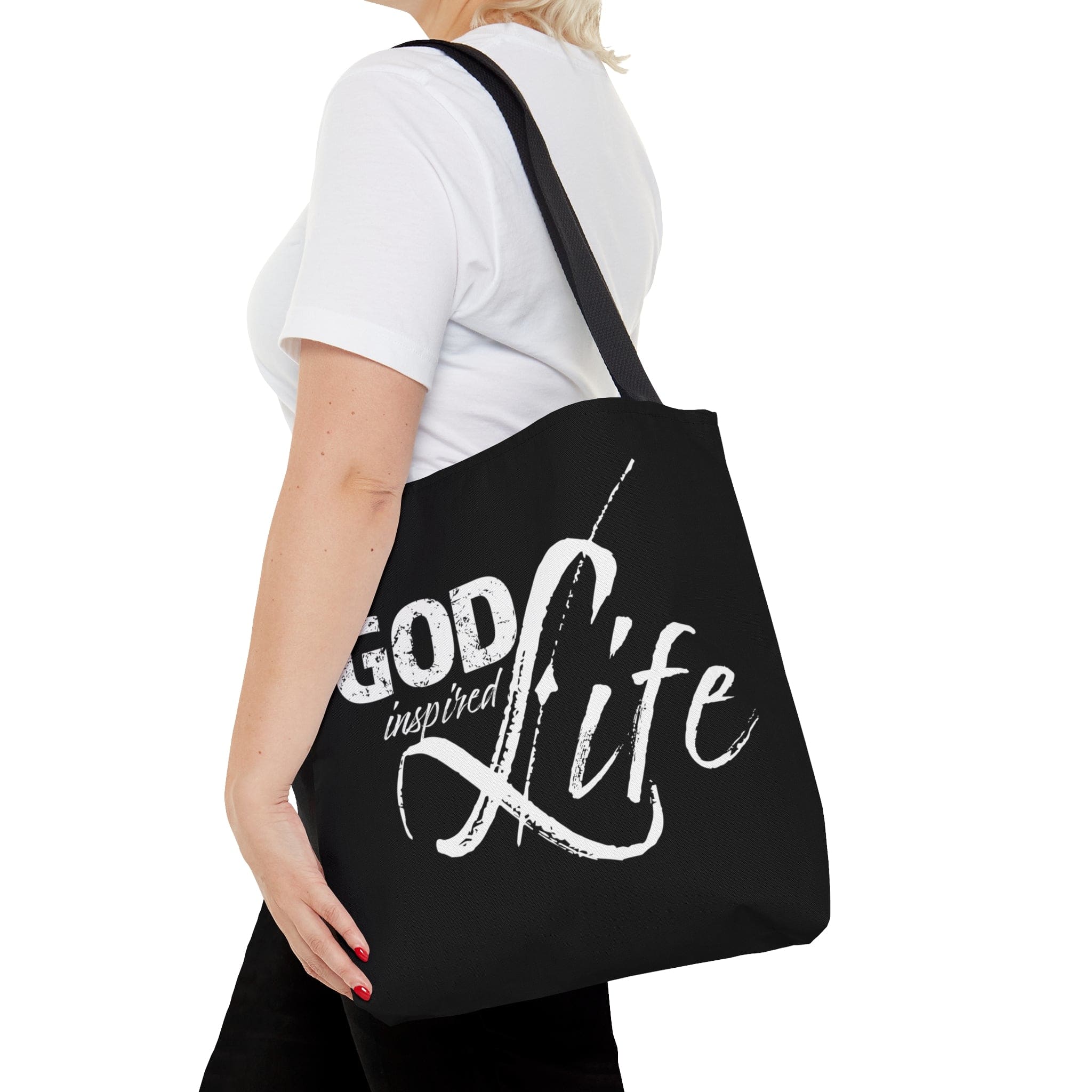 A stylish God Inspired Life Canvas Tote Bag featuring an inspirational quote, black cotton handles, and a chic design suitable for various occasions.