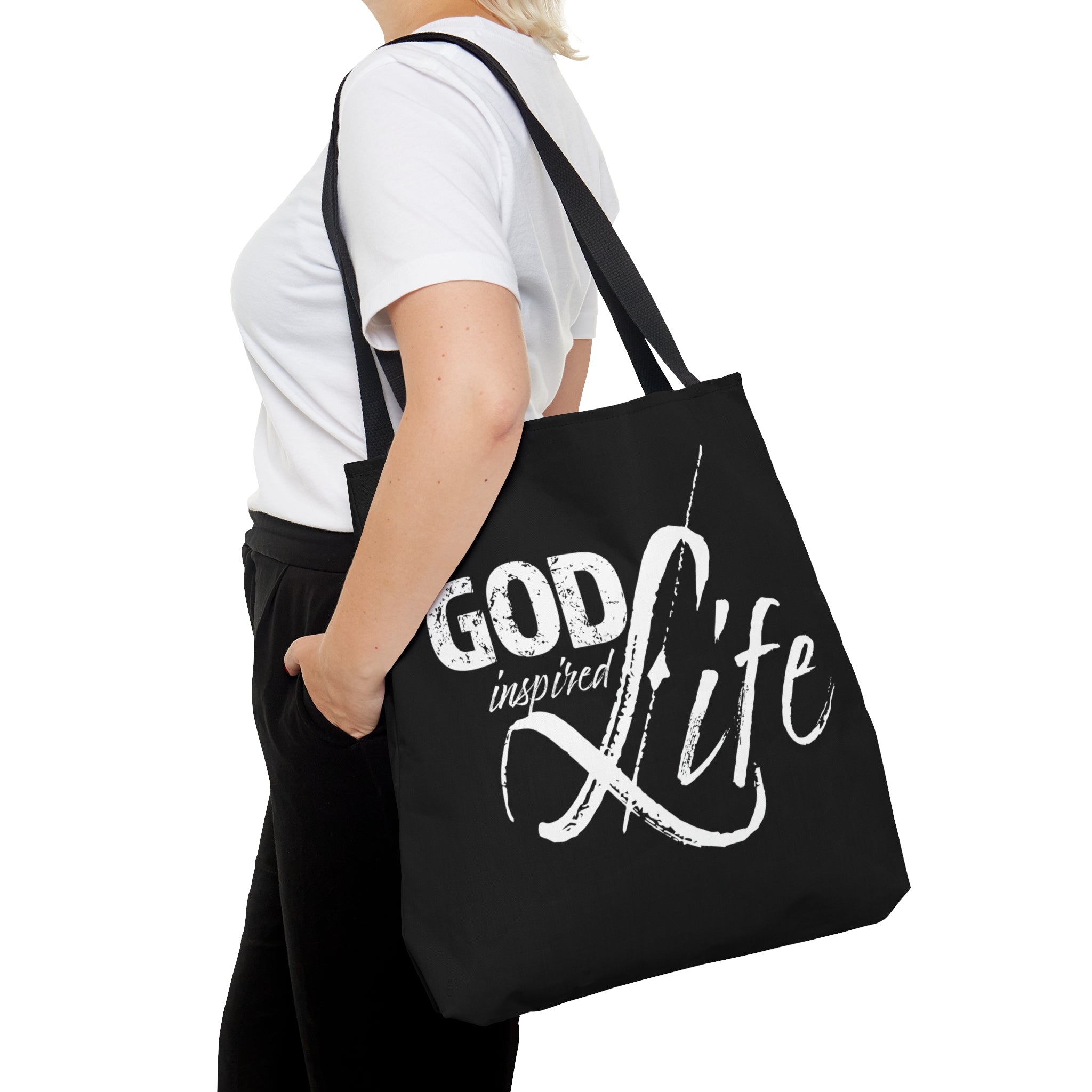 A stylish God Inspired Life Canvas Tote Bag featuring an inspirational quote, black cotton handles, and a chic design suitable for various occasions.