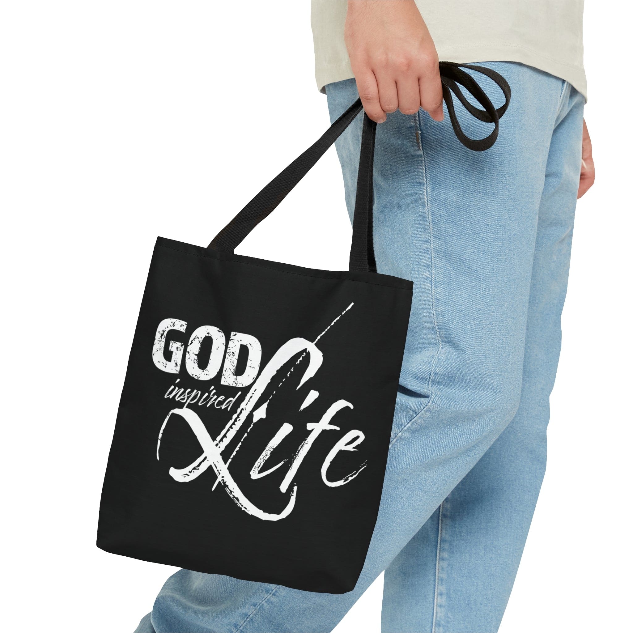 A stylish God Inspired Life Canvas Tote Bag featuring an inspirational quote, black cotton handles, and a chic design suitable for various occasions.