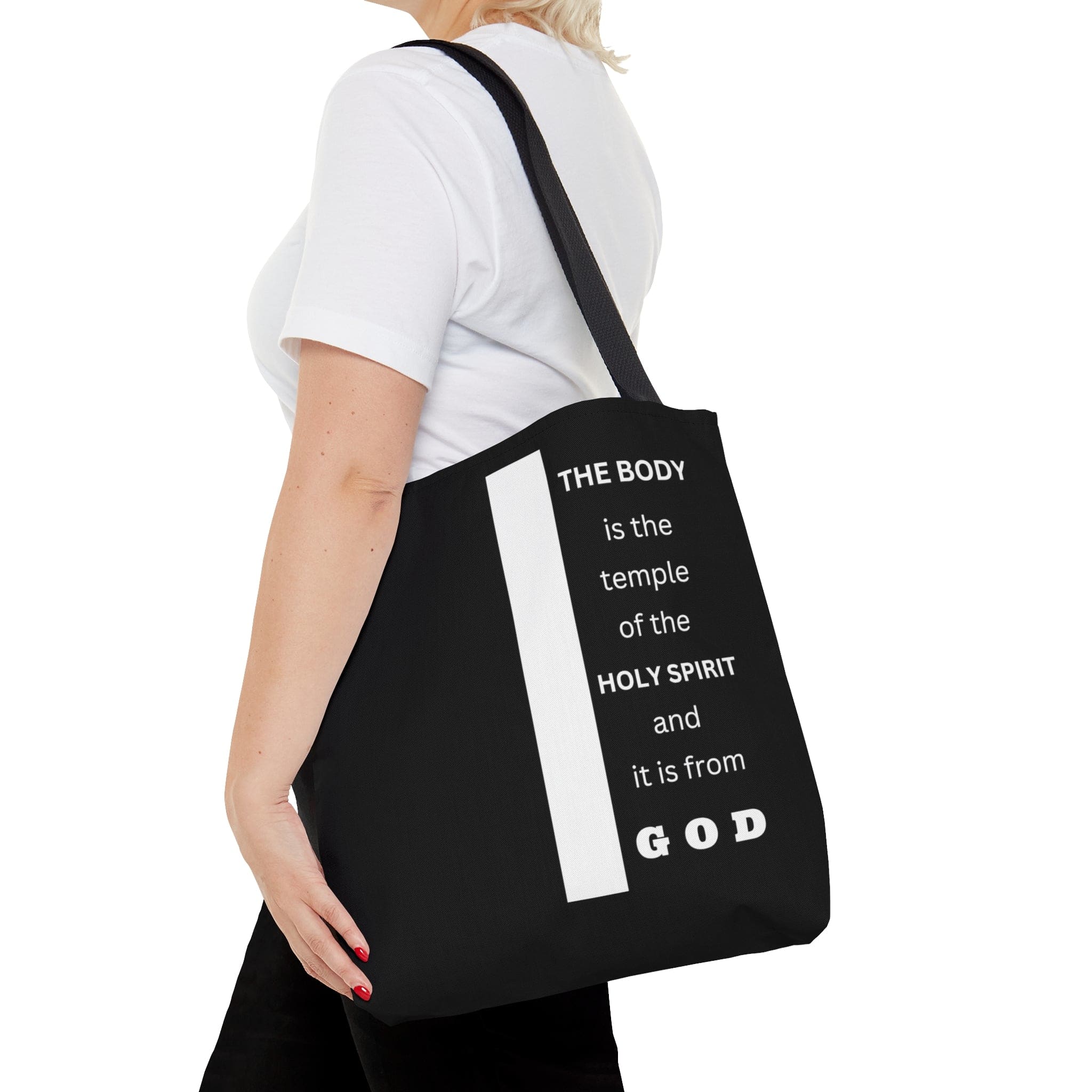 Canvas Tote Bag with scripture 'The Body is the Temple of the Holy Spirit', featuring a stylish all-over print and black cotton handles.