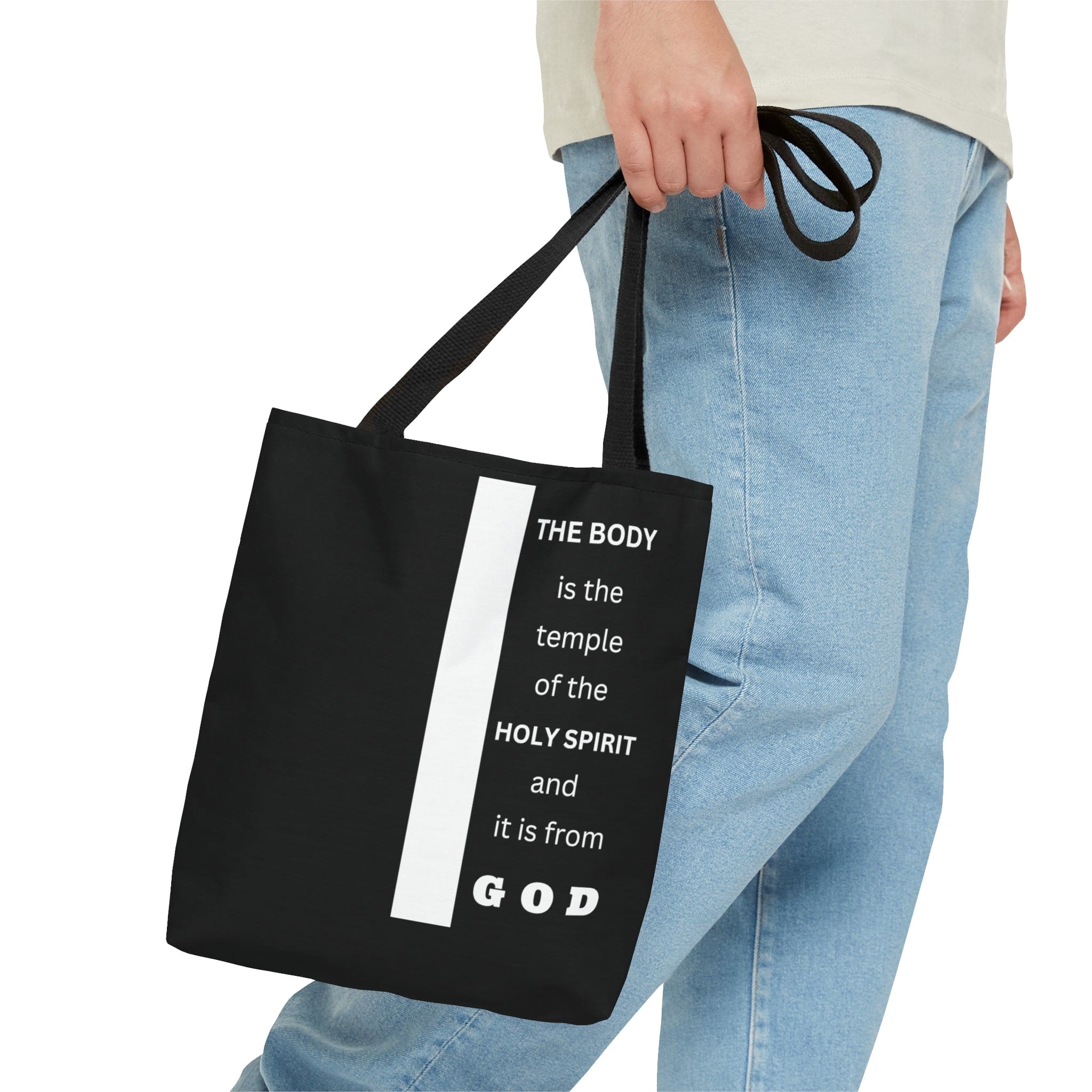 Canvas Tote Bag with scripture 'The Body is the Temple of the Holy Spirit', featuring a stylish all-over print and black cotton handles.