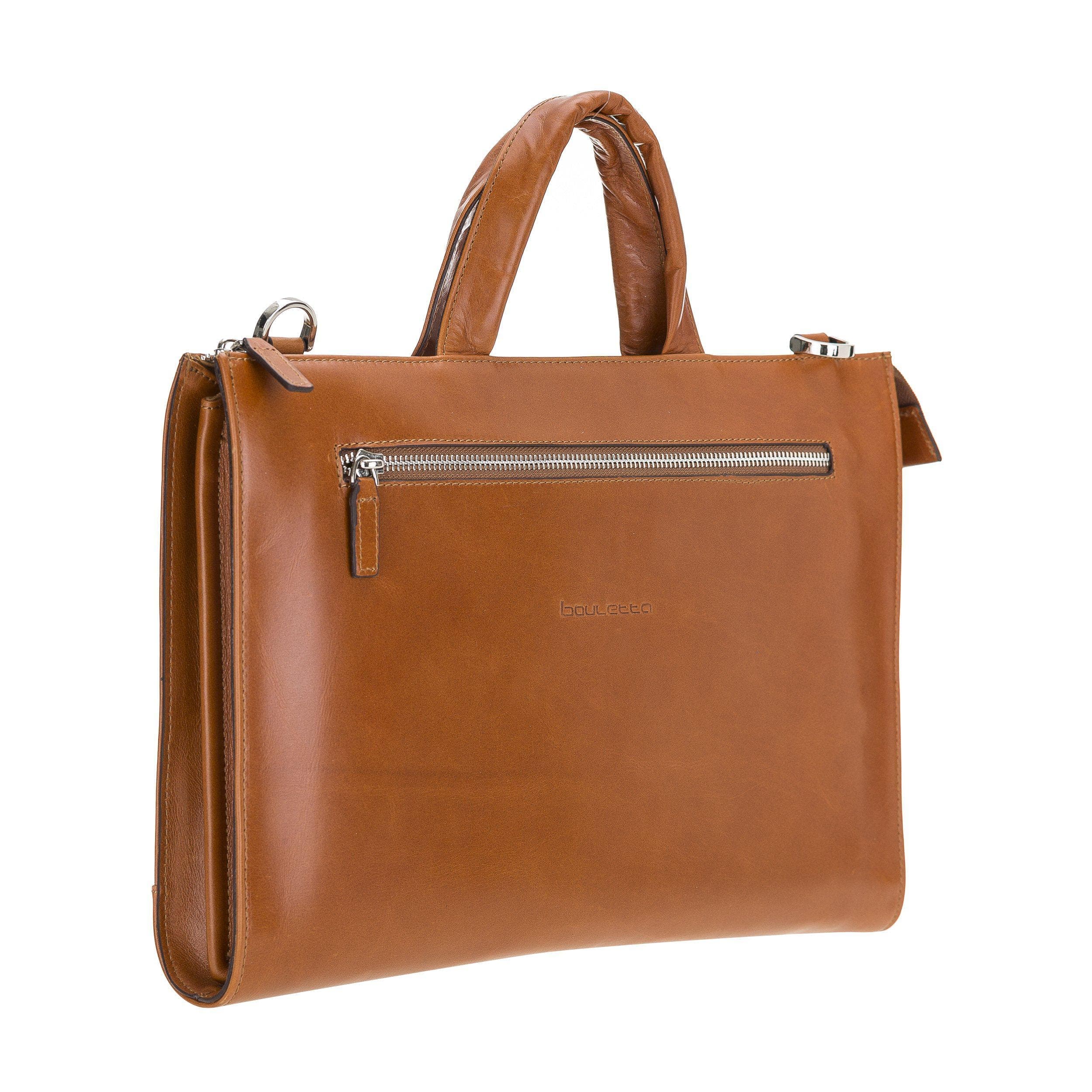 Canzo Leather Notebook Bag made from 100% genuine calf leather, featuring a zippered main compartment and adjustable shoulder straps.